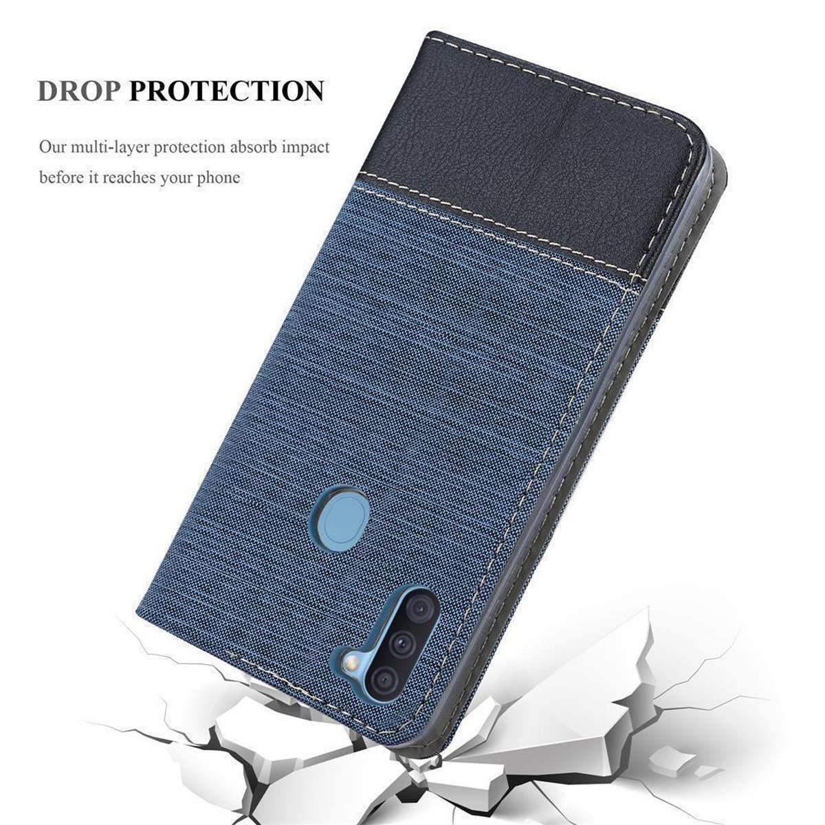Custodia per telefono in denim blu. Parte superiore nera, protezione dagli impatti e superficie incrinata.
