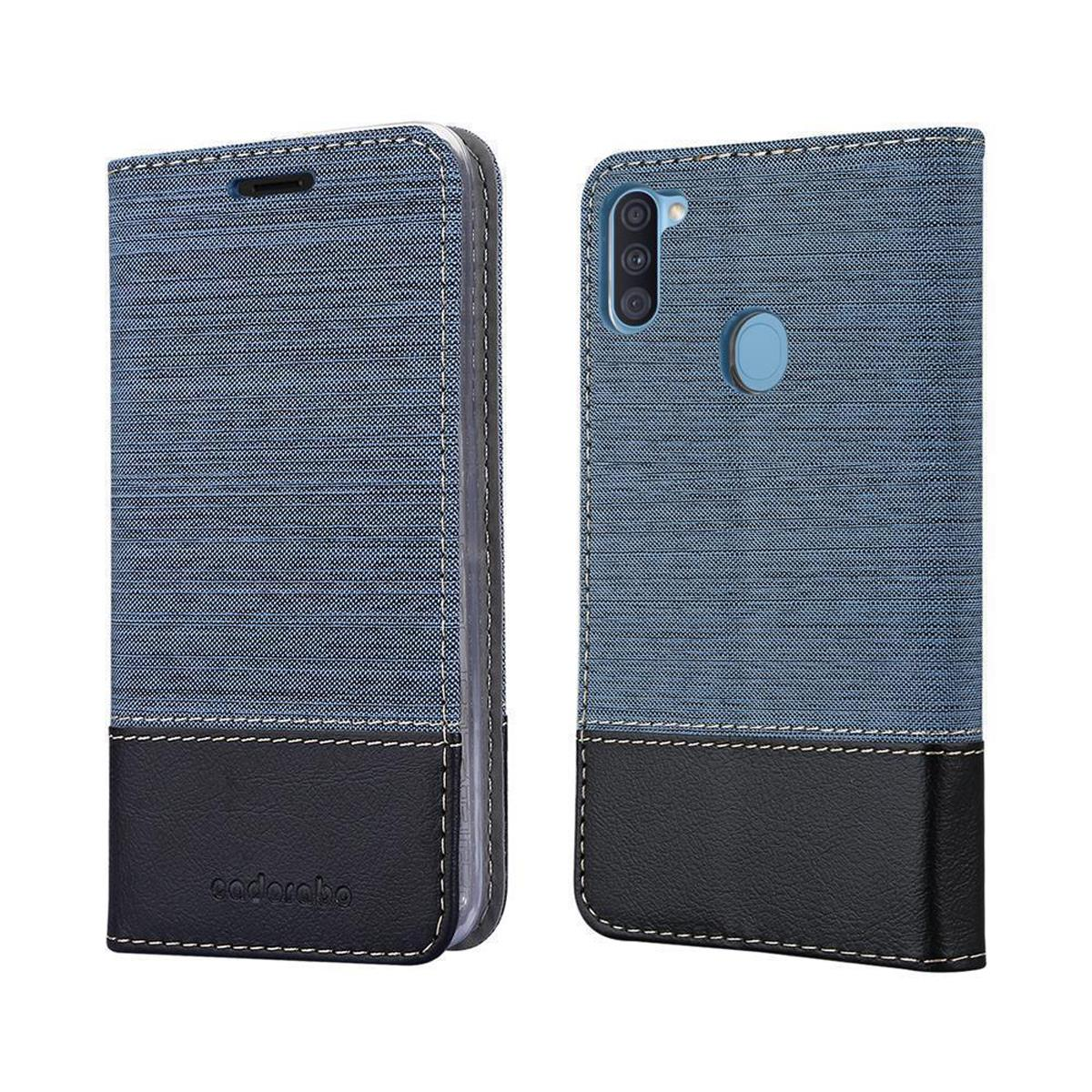 Custodia per telefono blu e nera con un telefono all'interno. La custodia è chiusa e aperta. Marca: cadorabo.
