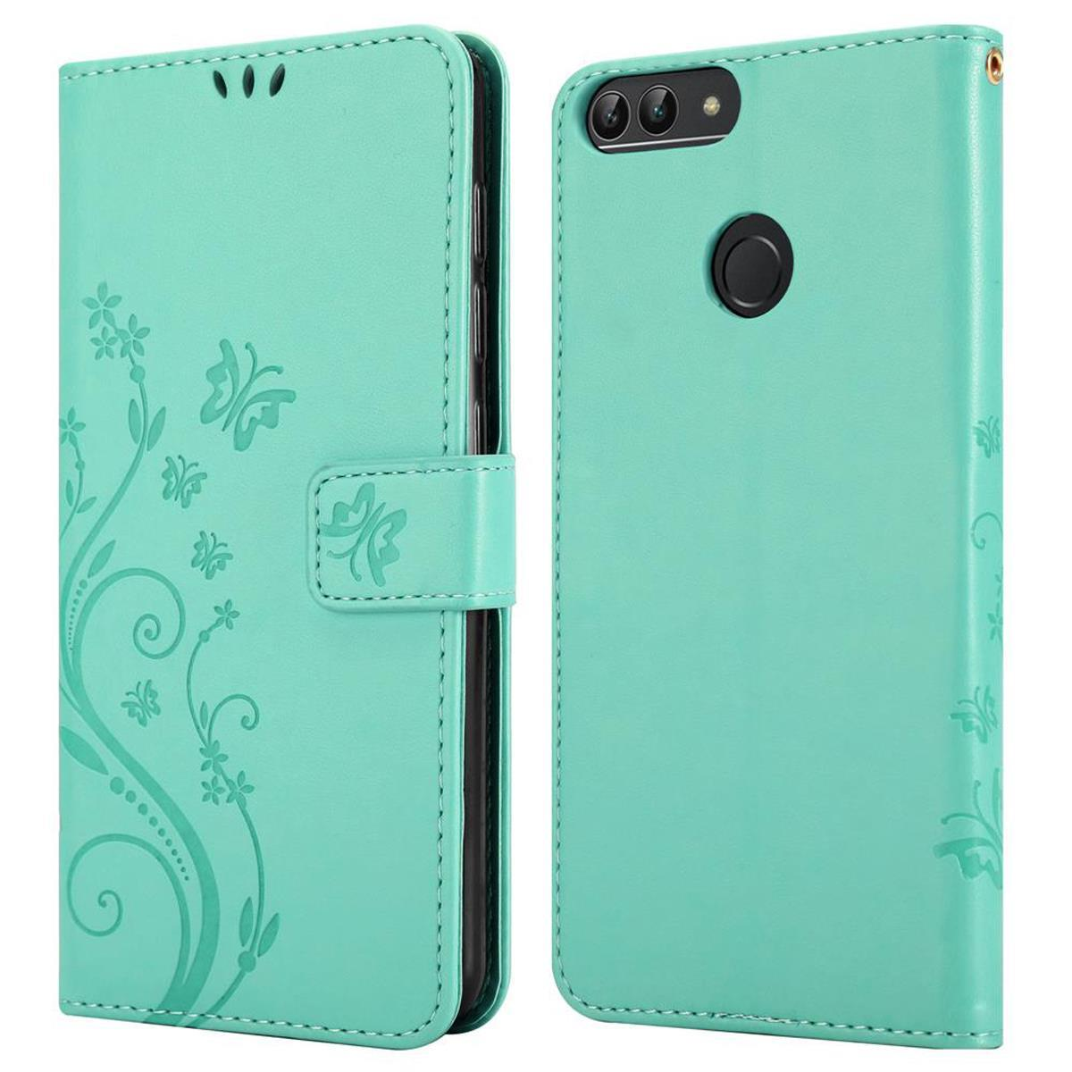 Custodia per telefono turchese con design floreale e ritagli a farfalla, aperta e chiusa.