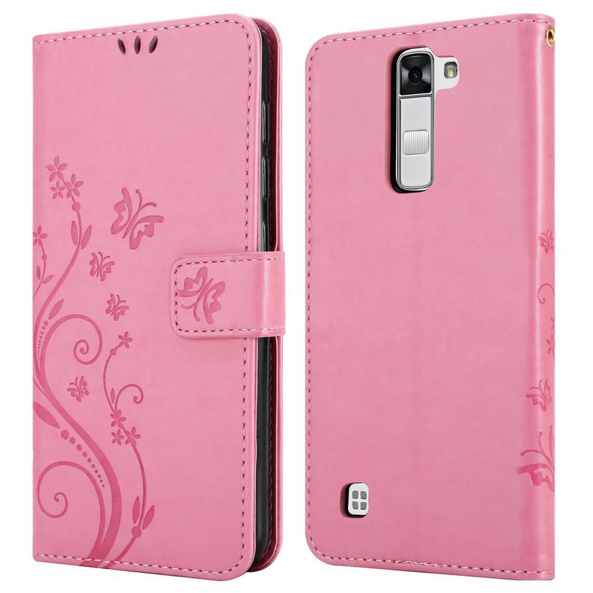 Funda de teléfono rosa con diseño floral y mariposas, abierta para mostrar el teléfono.