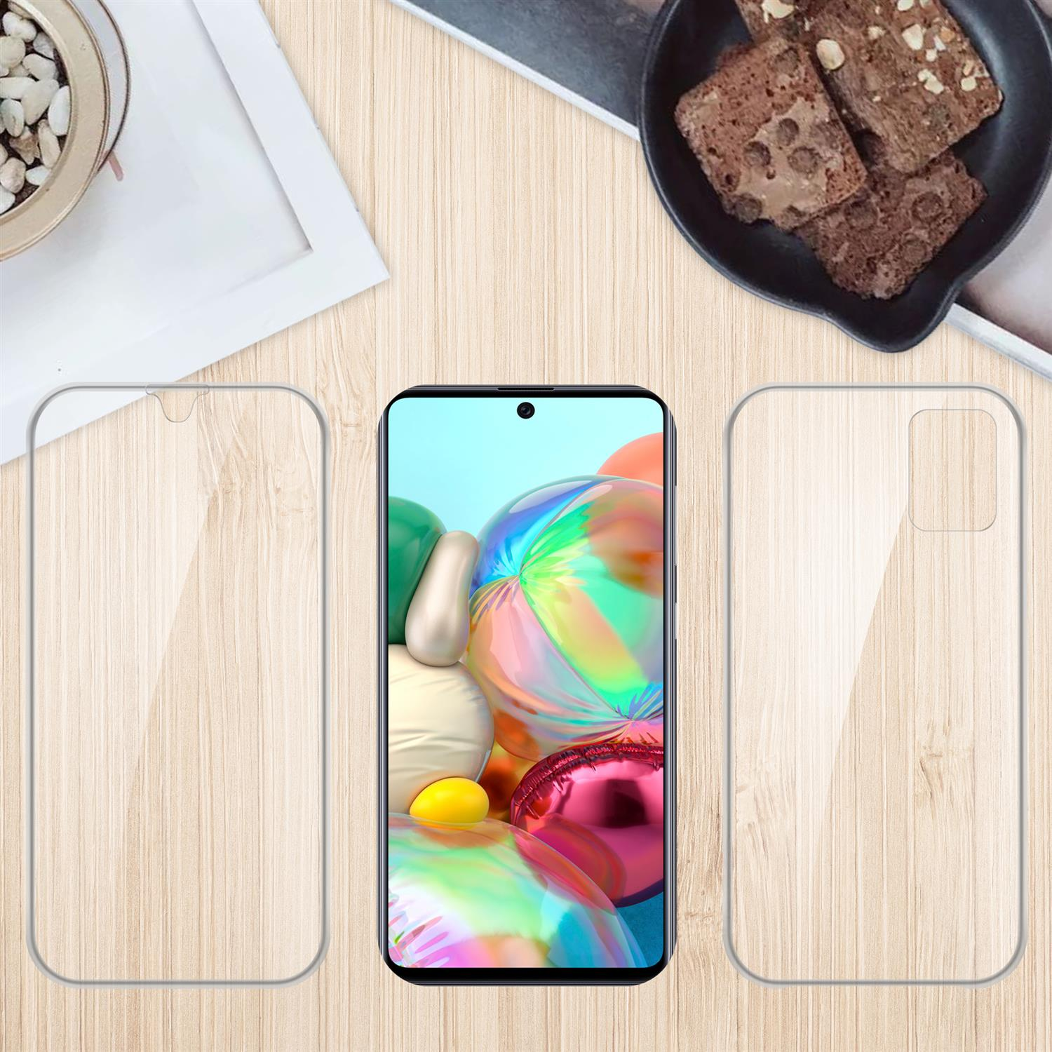 Telefon, Displayschutz und Hülle auf Holzoberfläche mit Essen.