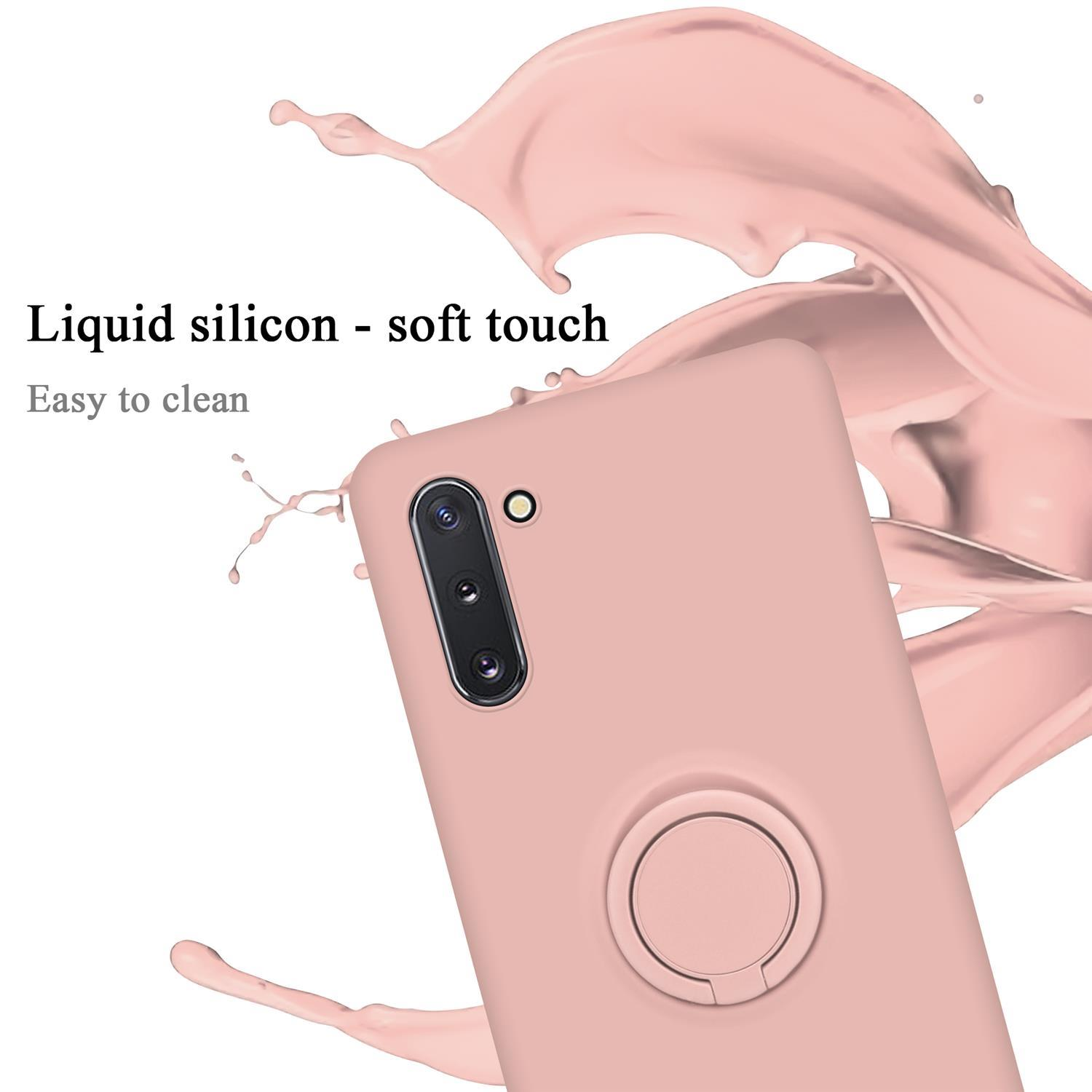 Custodia per telefono rosa con anello di supporto. Caratterizzata da silicone liquido soft touch. Spruzzo rosa chiaro.