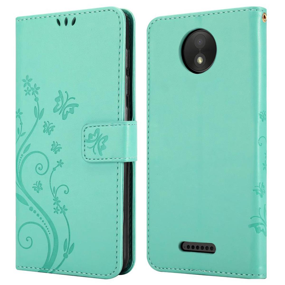 Una custodia per telefono verde acqua, chiusa, con un design floreale e farfalle.