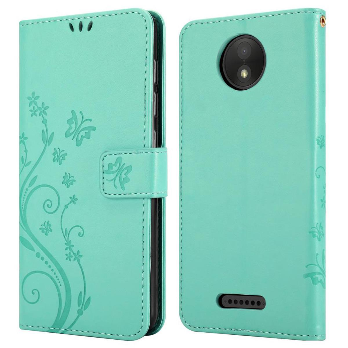 Custodia per telefono verde menta con design floreale, si apre a libro. Mostra fotocamera e pulsante.