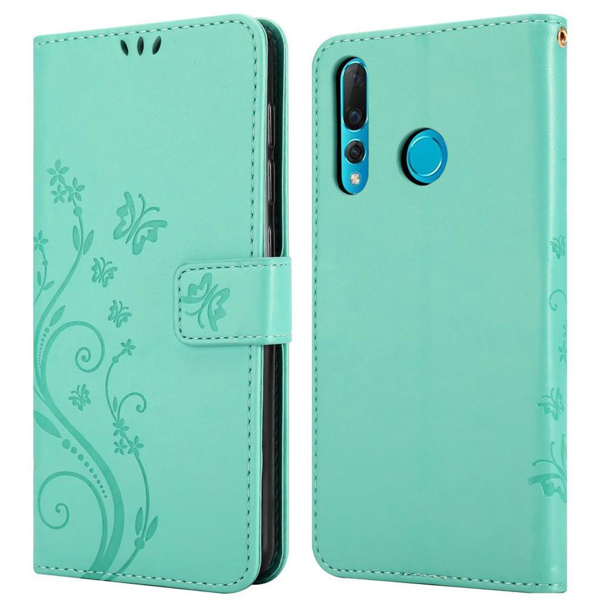 Una custodia per telefono verde menta, aperta e chiusa, con dettagli floreali e farfalle, che mostra il telefono.