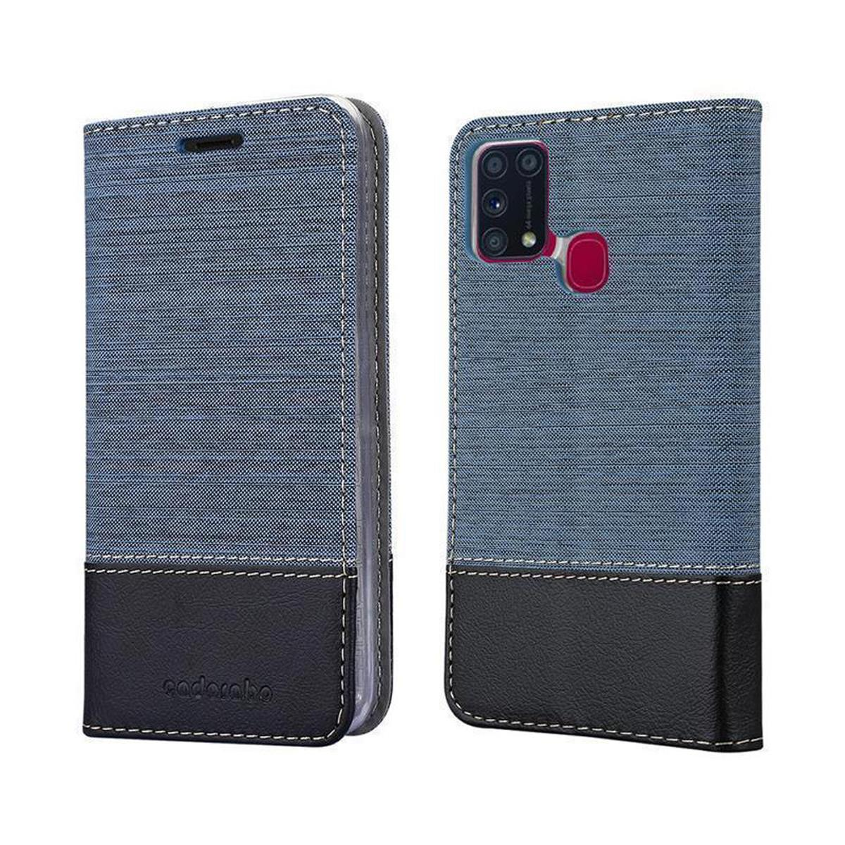Una custodia per telefono blu e nera. La custodia è aperta. È realizzata in un materiale simile al denim e pelle nera.