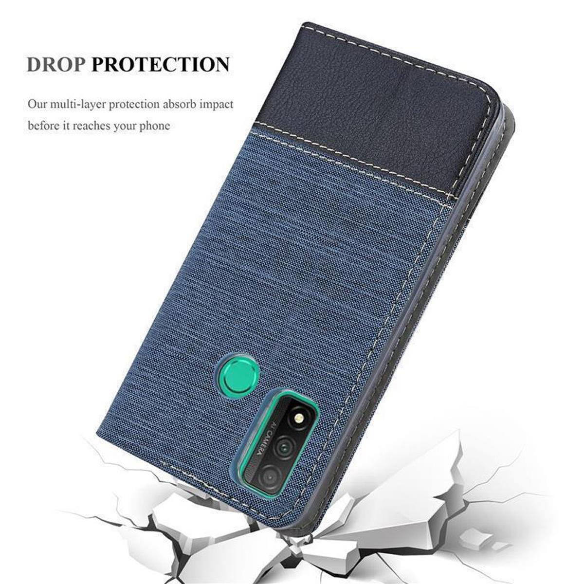 Custodia per telefono blu e nera, con obiettivo della fotocamera verde. Testo: 'Protezione dalle cadute'.