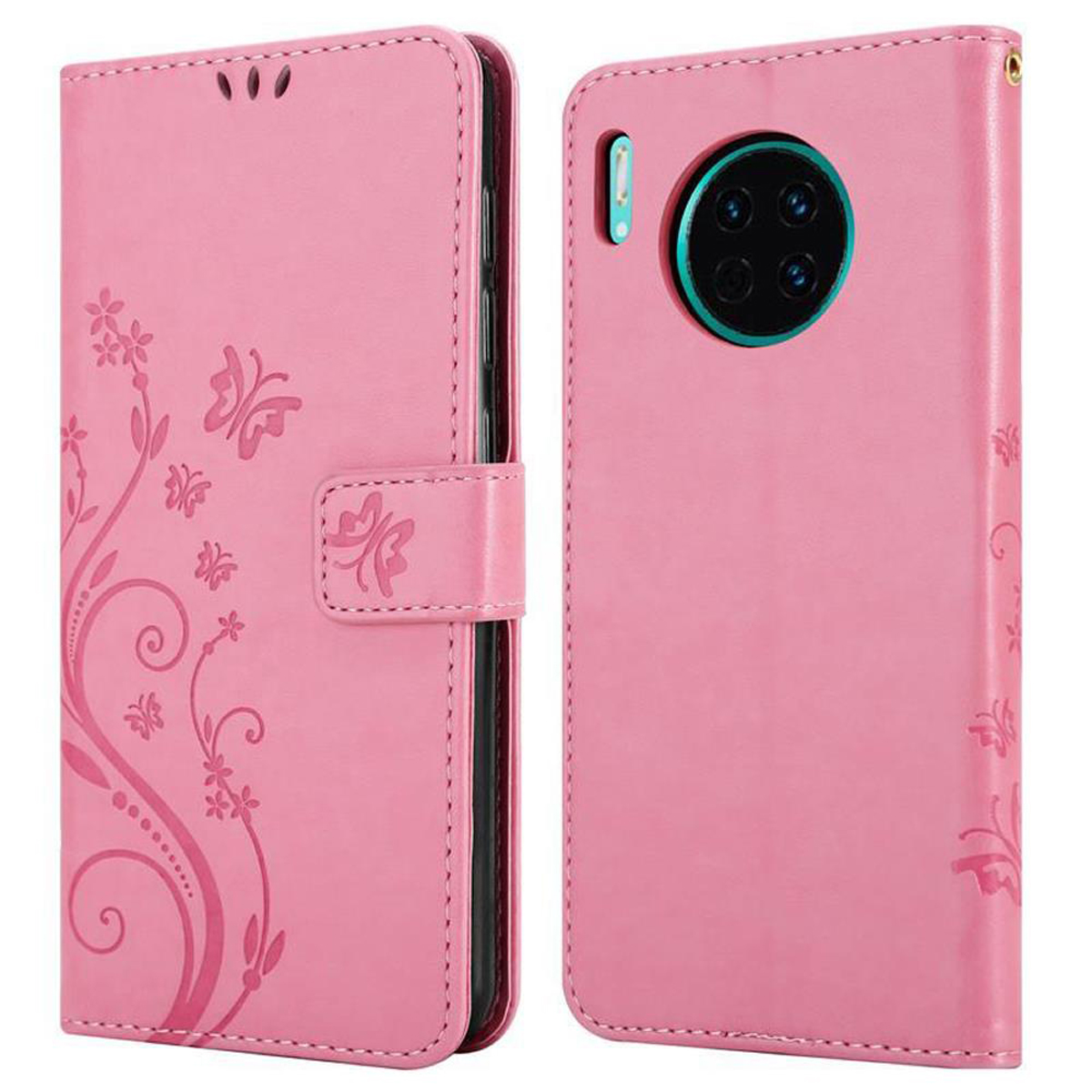 Una custodia rosa per telefono è aperta. Ha un design floreale e una chiusura magnetica.