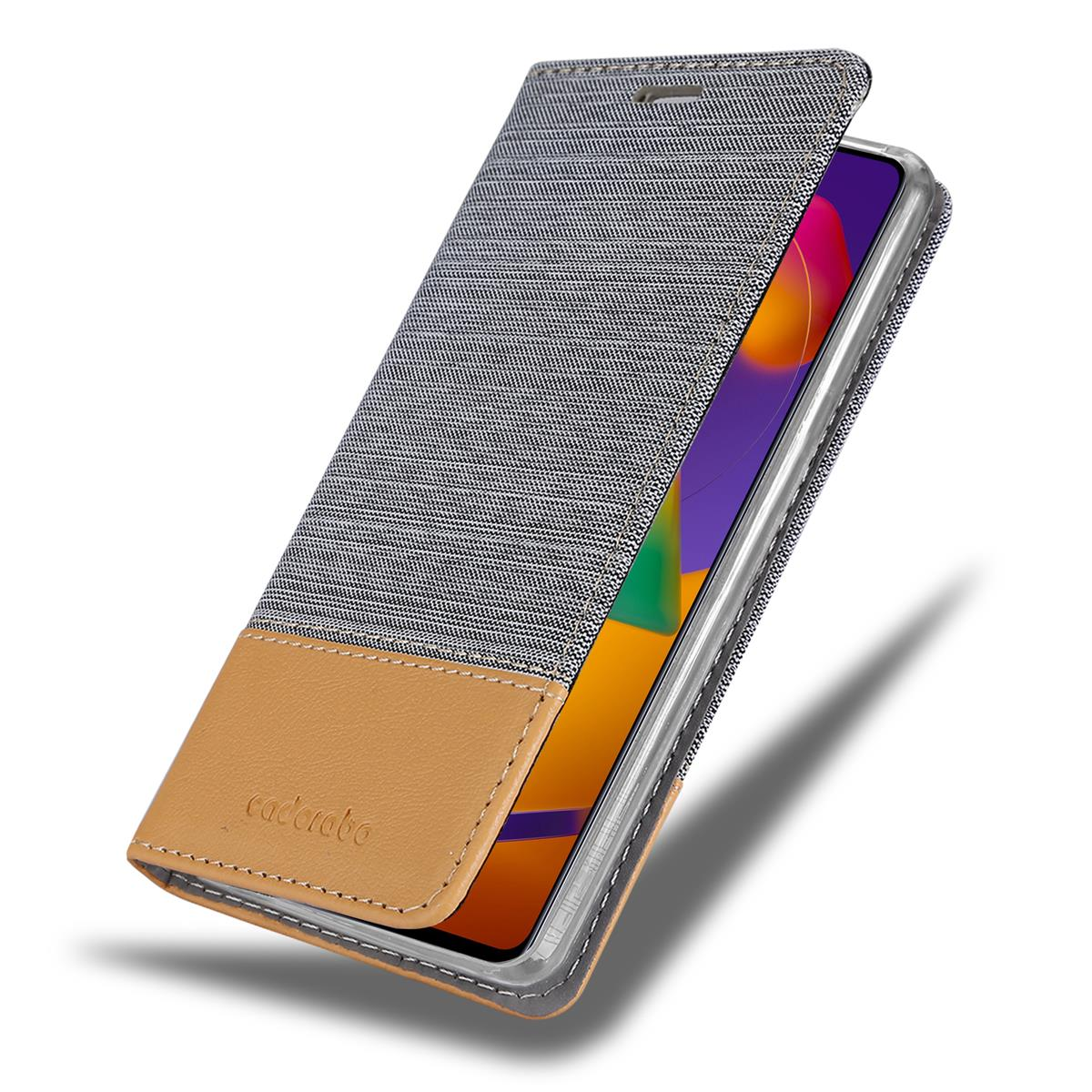 Geöffnete Handyhülle, Denim und Beige, mit einem angezeigten Telefonbildschirm.