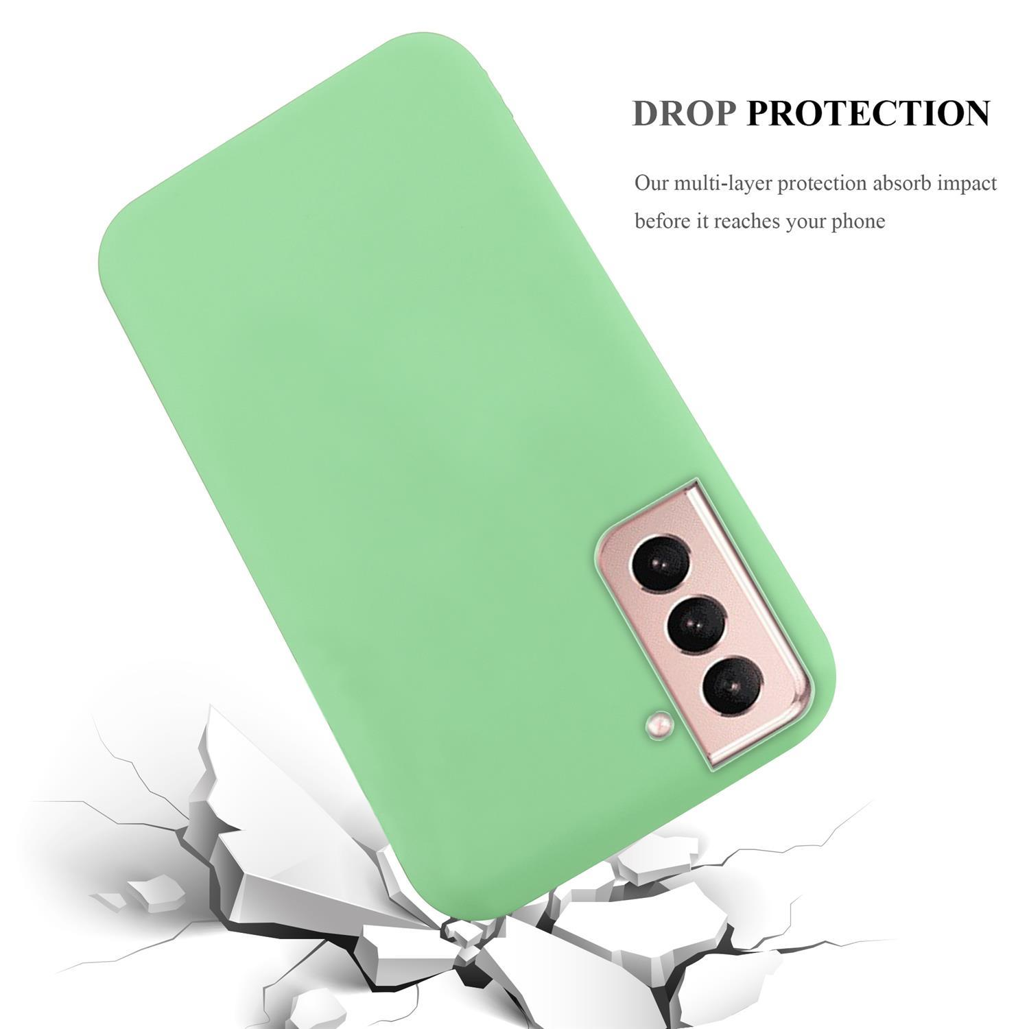 Custodia verde per telefono con telefono all'interno. Su sfondo bianco con superficie crepata.