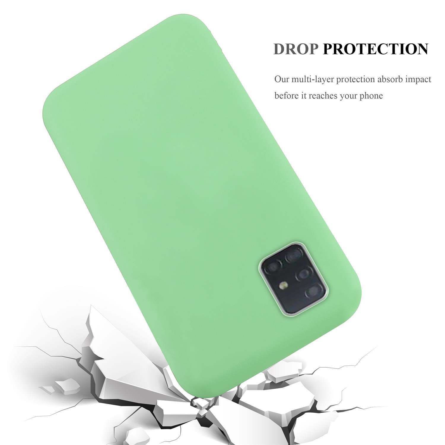 Custodia verde su terreno bianco crepato. Testo: PROTEZIONE CADUTA. La custodia assorbe l'impatto.