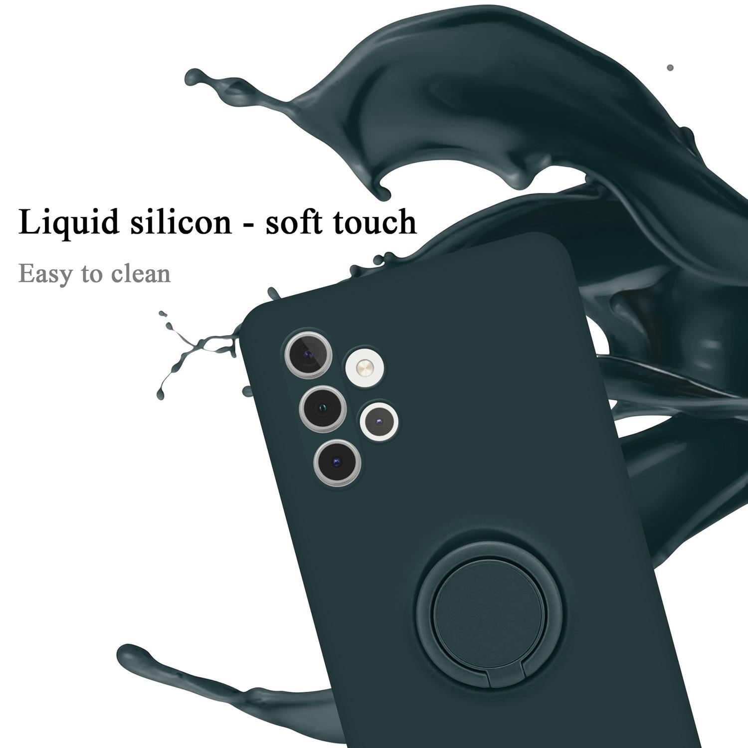Dunkle Handyhülle mit Ring. Spritzer dunkler grüner Flüssigkeit im Hintergrund. Text lautet 'Liquid silicon'.