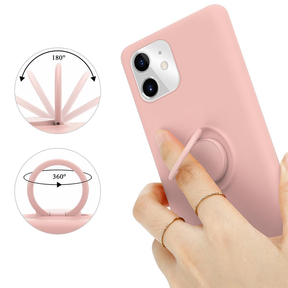 Un telefono rosa con un supporto ad anello nella mano di una donna e diagrammi del movimento dell'anello.