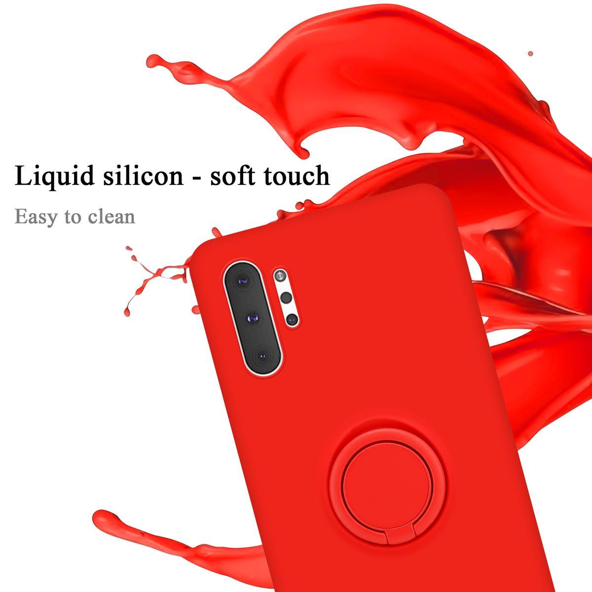 Telefono rosso con custodia e spruzzo di liquido rosso.