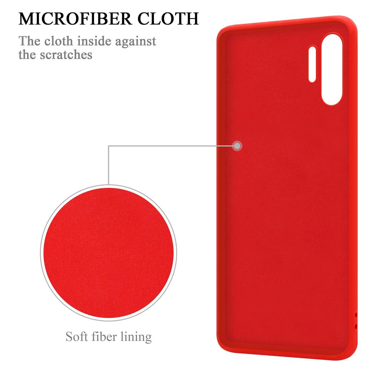 Custodia per telefono rossa con un panno in microfibra rosso. Testo: Fodera in fibra morbida. Il panno all'interno contro i graffi.