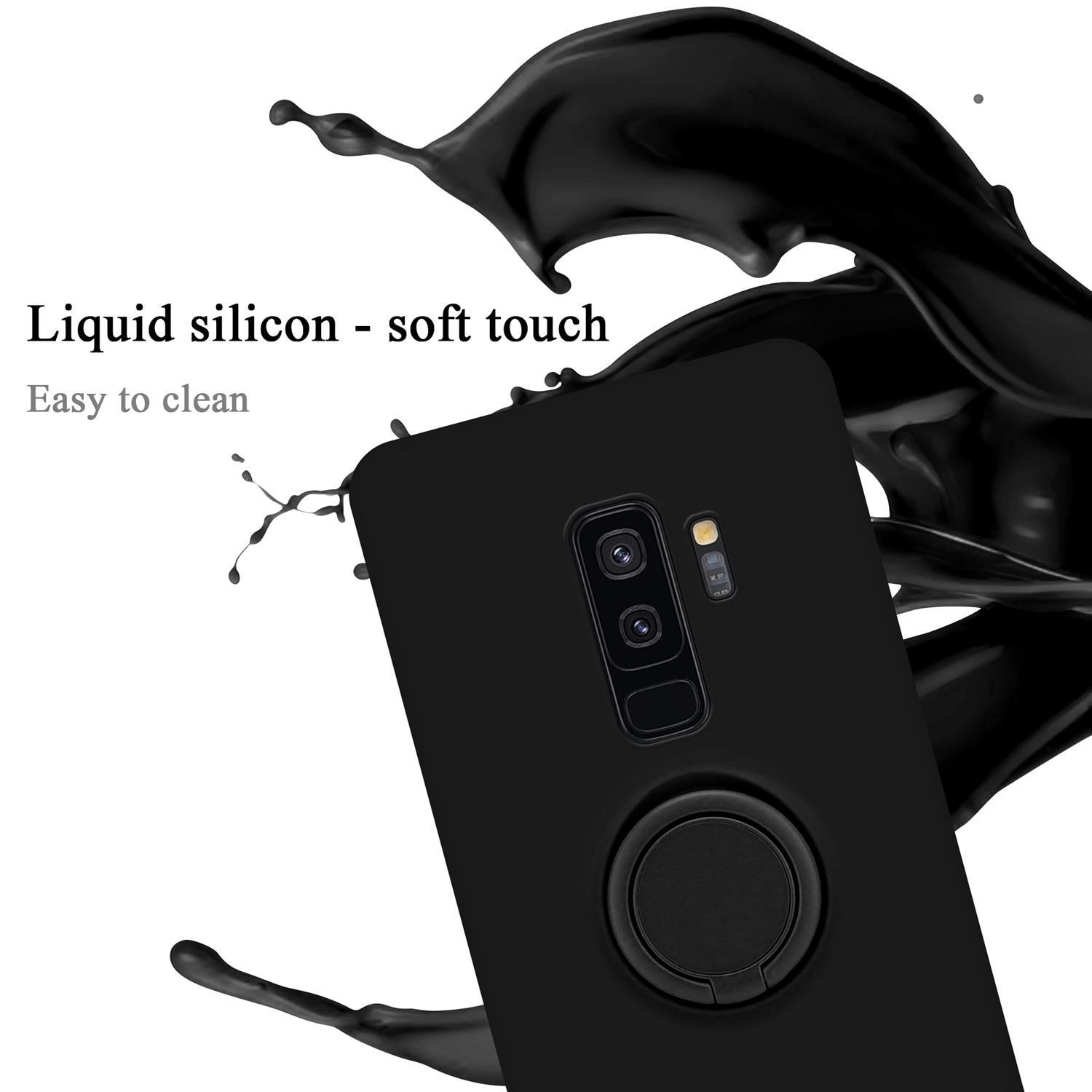 Custodia per telefono nera con anello. Schizzo di liquido nero sullo sfondo. Testo: Silicone liquido - tocco morbido, facile da pulire.