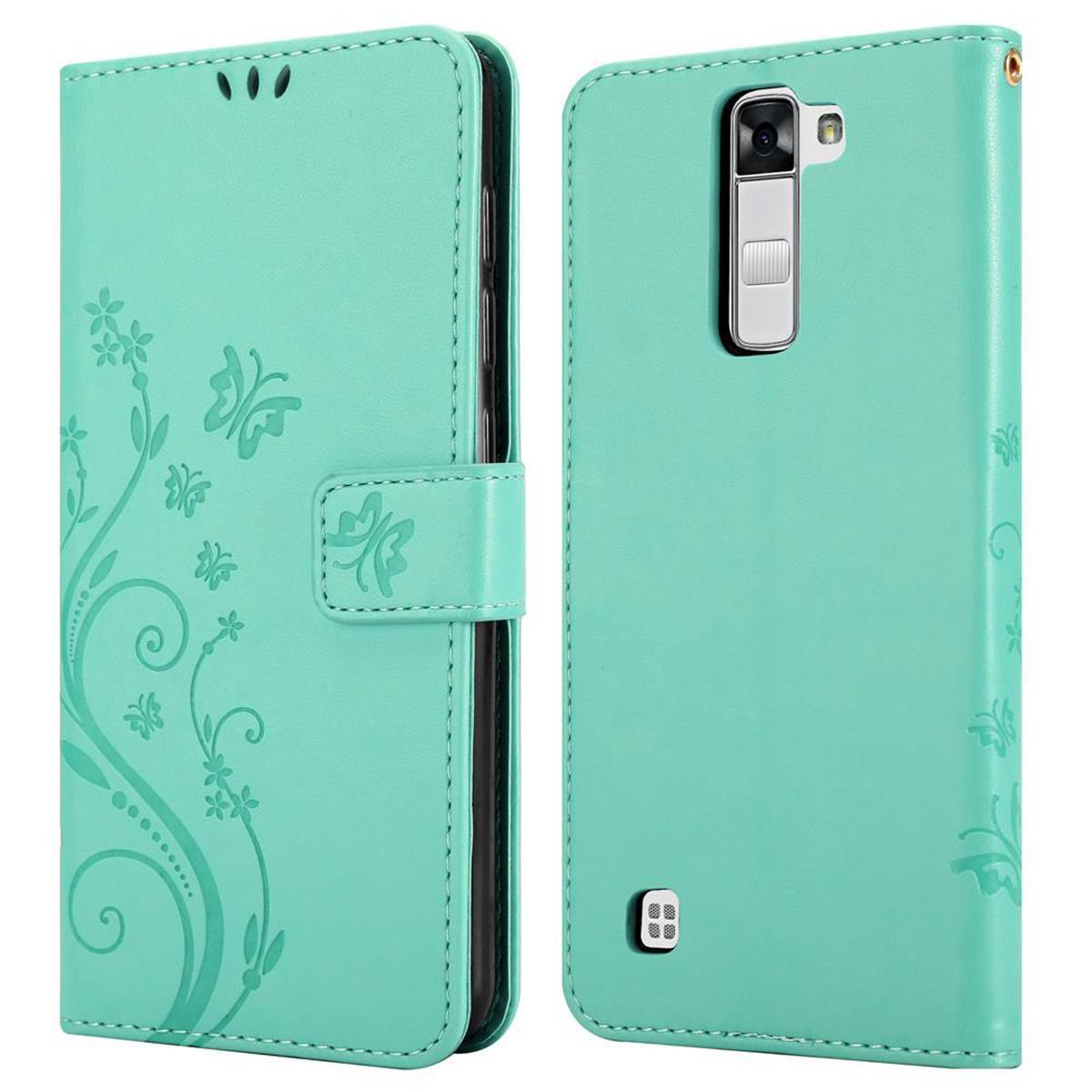 Funda de teléfono turquesa, abierta, mostrando un diseño floral en el frente y la parte trasera.