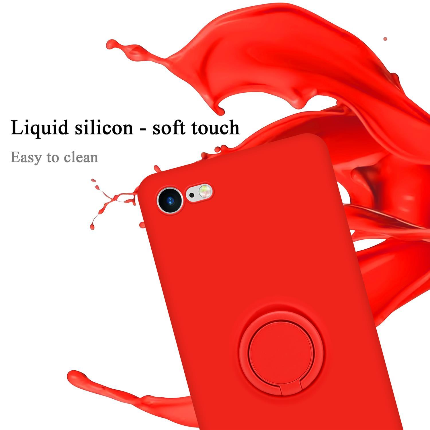 Custodia per telefono rossa con anello di supporto, accanto a uno spruzzo rosso.