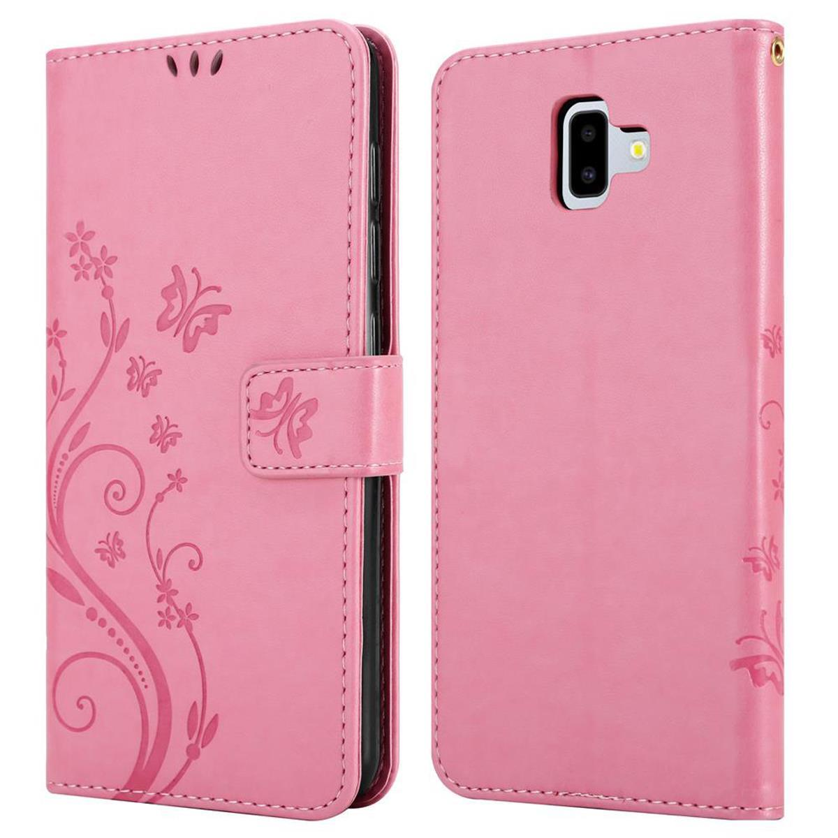 Custodia per telefono rosa con un design a farfalla. La custodia è mostrata chiusa e aperta.