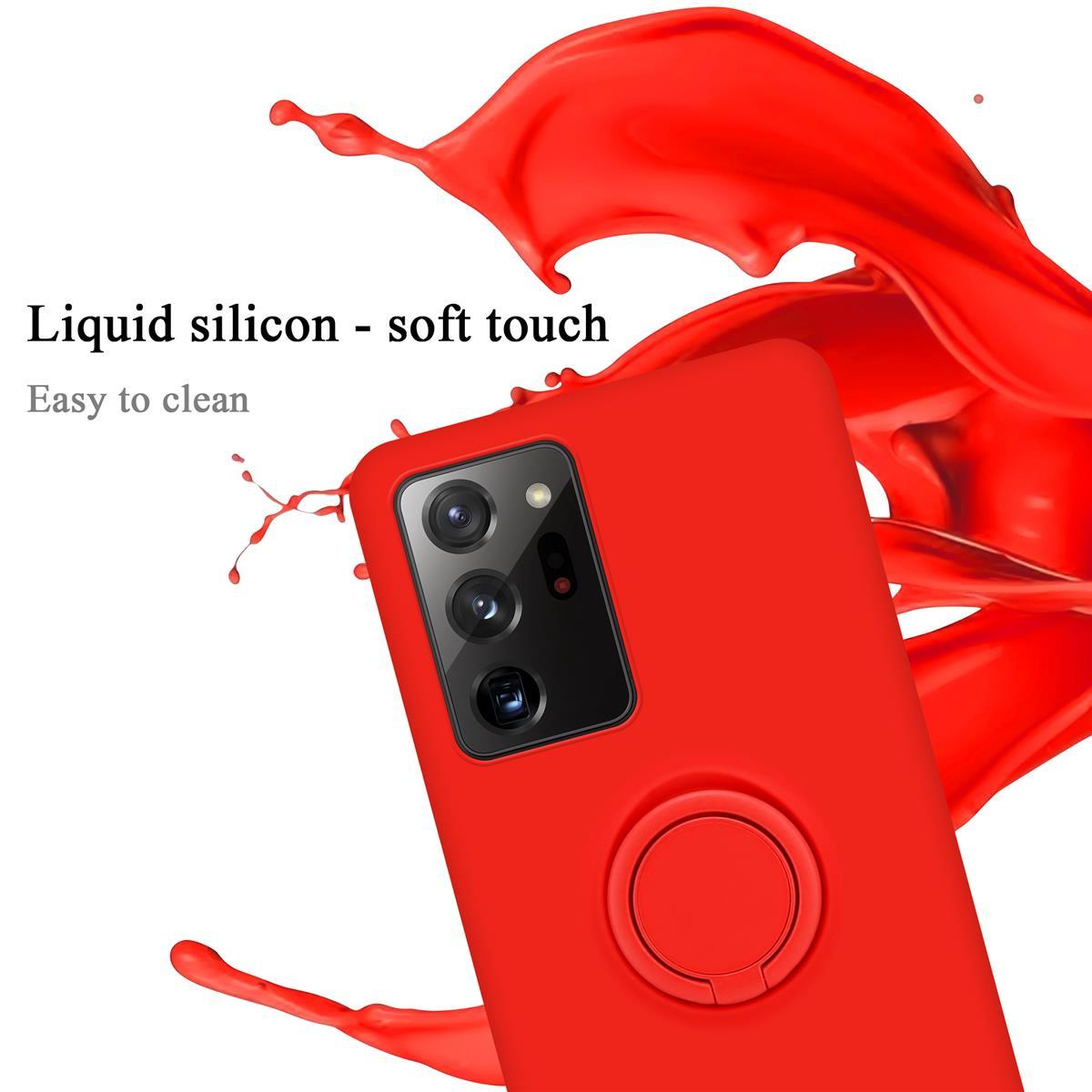 Custodia rossa con anello. Schizzo rosso sullo sfondo. Testo: Silicone liquido, soft touch, facile da pulire.