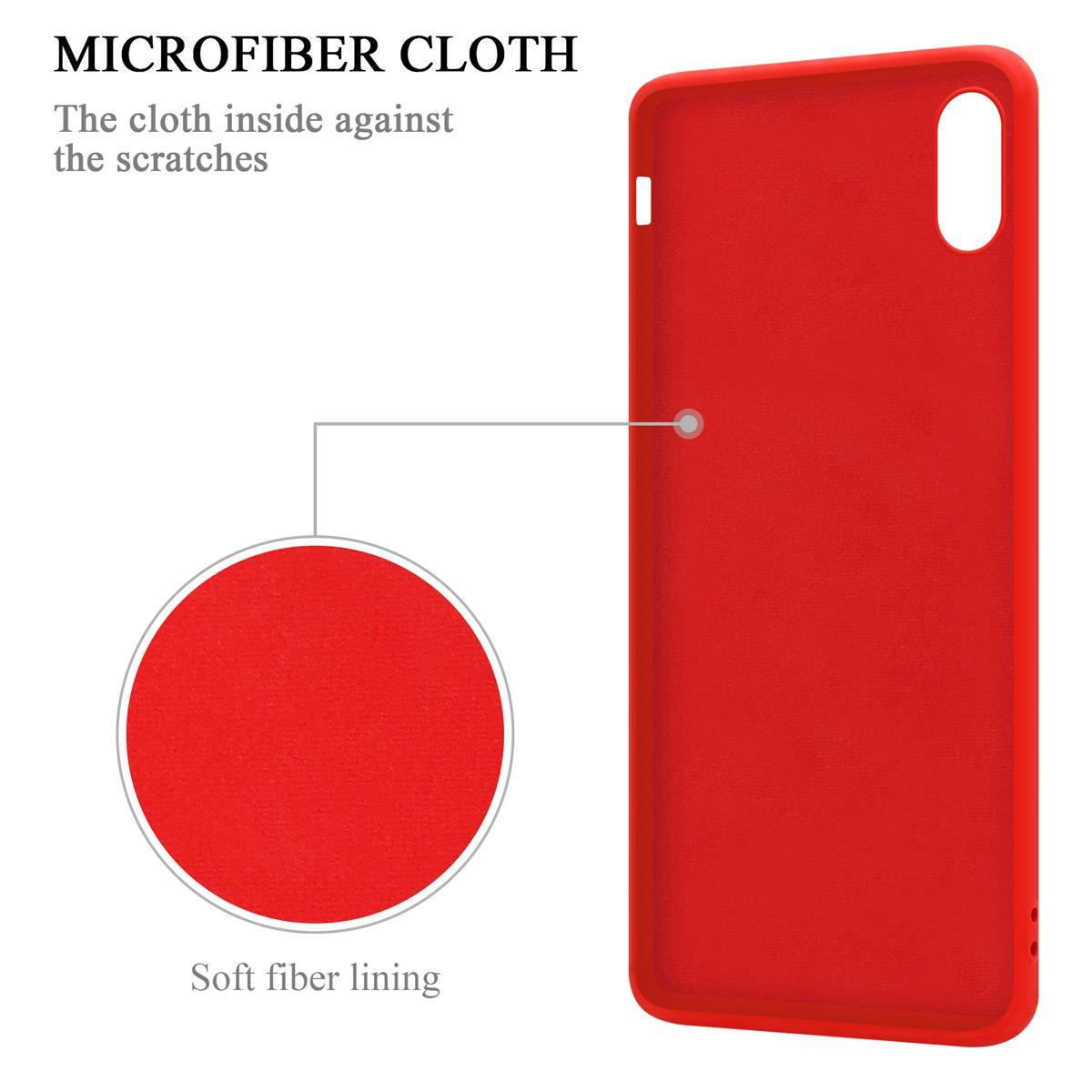 Interno della custodia del telefono rosso, che mostra il panno in microfibra. Il testo dice: Fodera in fibra morbida.