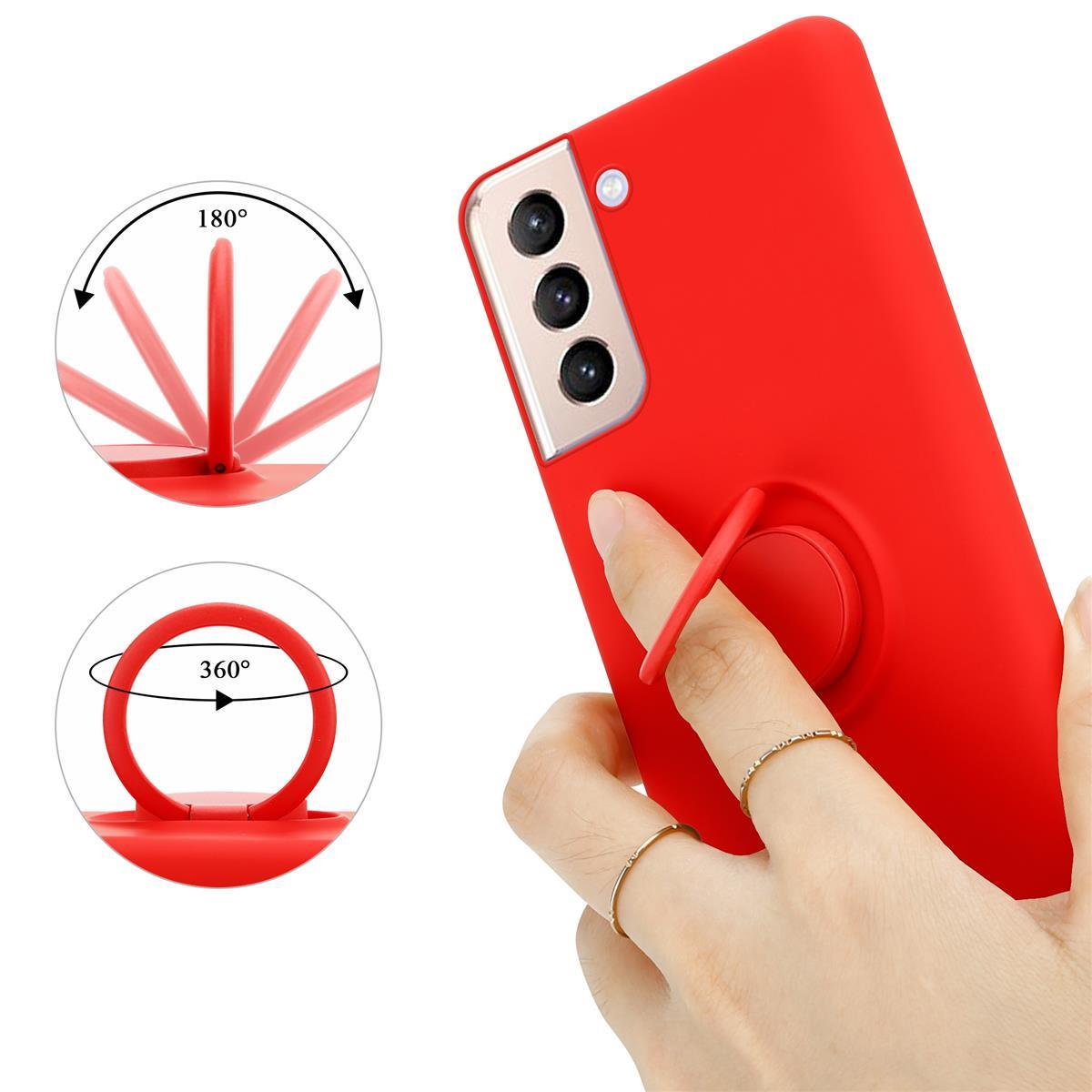 Custodia rossa con supporto ad anello. Una mano tiene il telefono, con anelli. Lo sfondo mostra il movimento dell'anello.