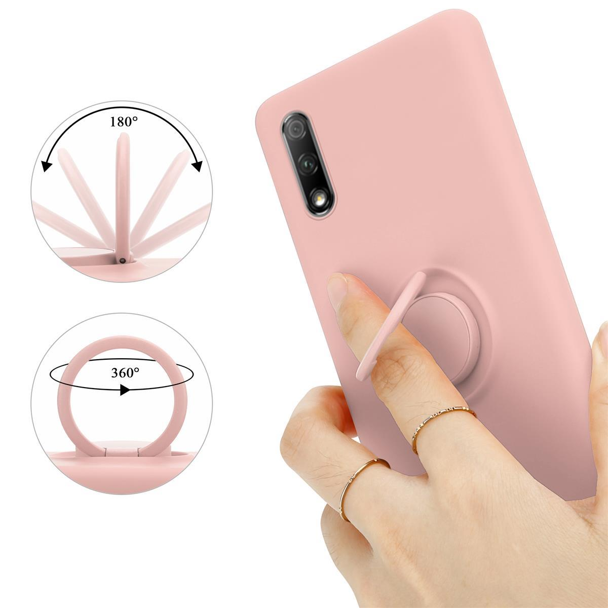 Custodia per telefono rosa con supporto ad anello. Una mano tiene il telefono, mostrando la rotazione.