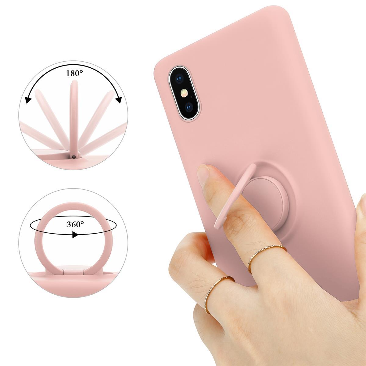 Una mano tiene un telefono rosa con un supporto ad anello. Le frecce mostrano la rotazione di 180° e 360°.