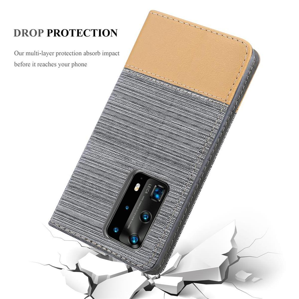 Handyhülle mit Telefon darin, liegt auf einer Oberfläche. Die Handyhülle ist zweifarbig.