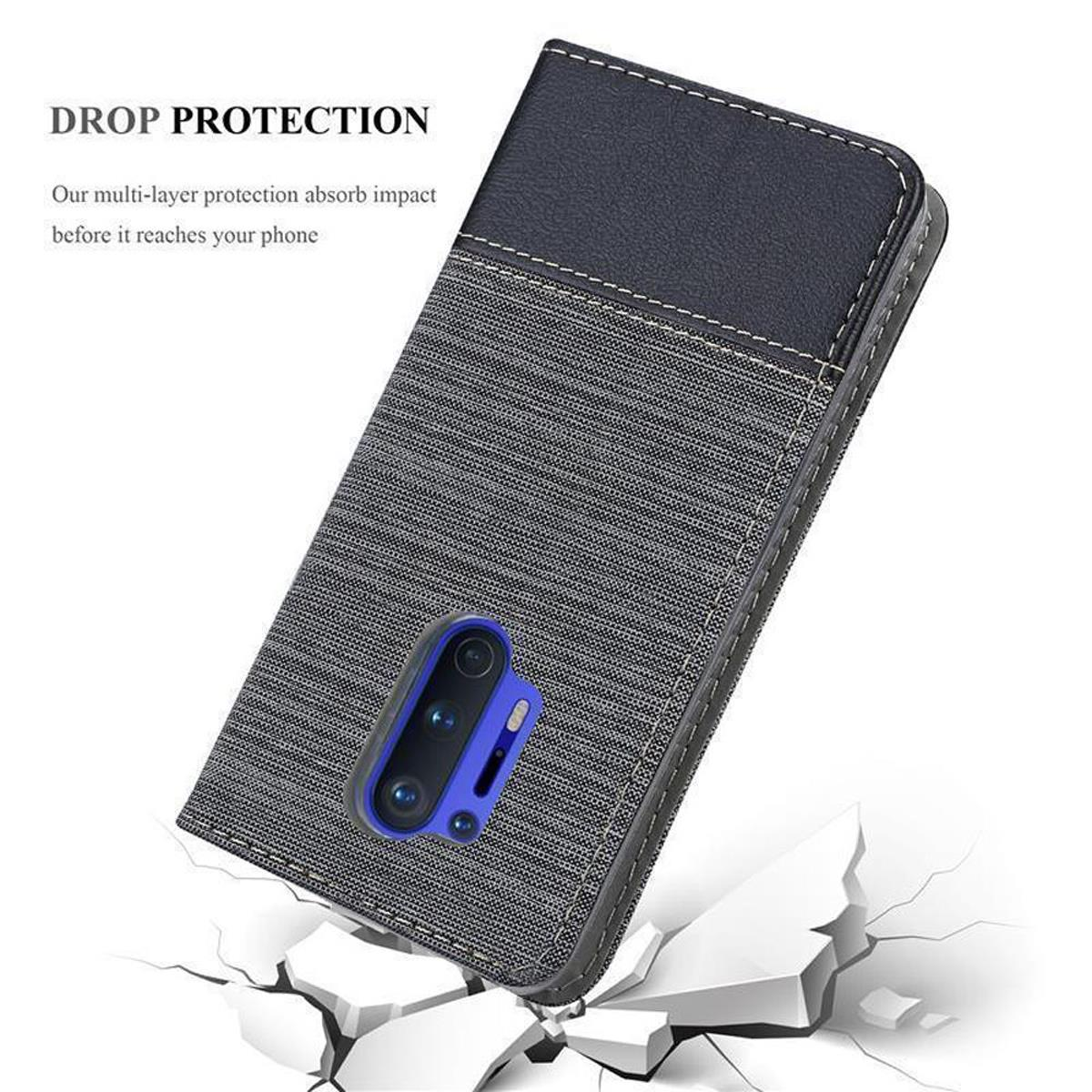 Custodia del telefono aperta, con telefono all'interno. Grigio e nero con testo sulla protezione.
