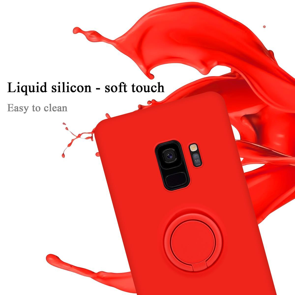 Una custodia per telefono rossa con un supporto ad anello. Schizzo di liquido rosso sullo sfondo, testo 'Liquid silicon'.