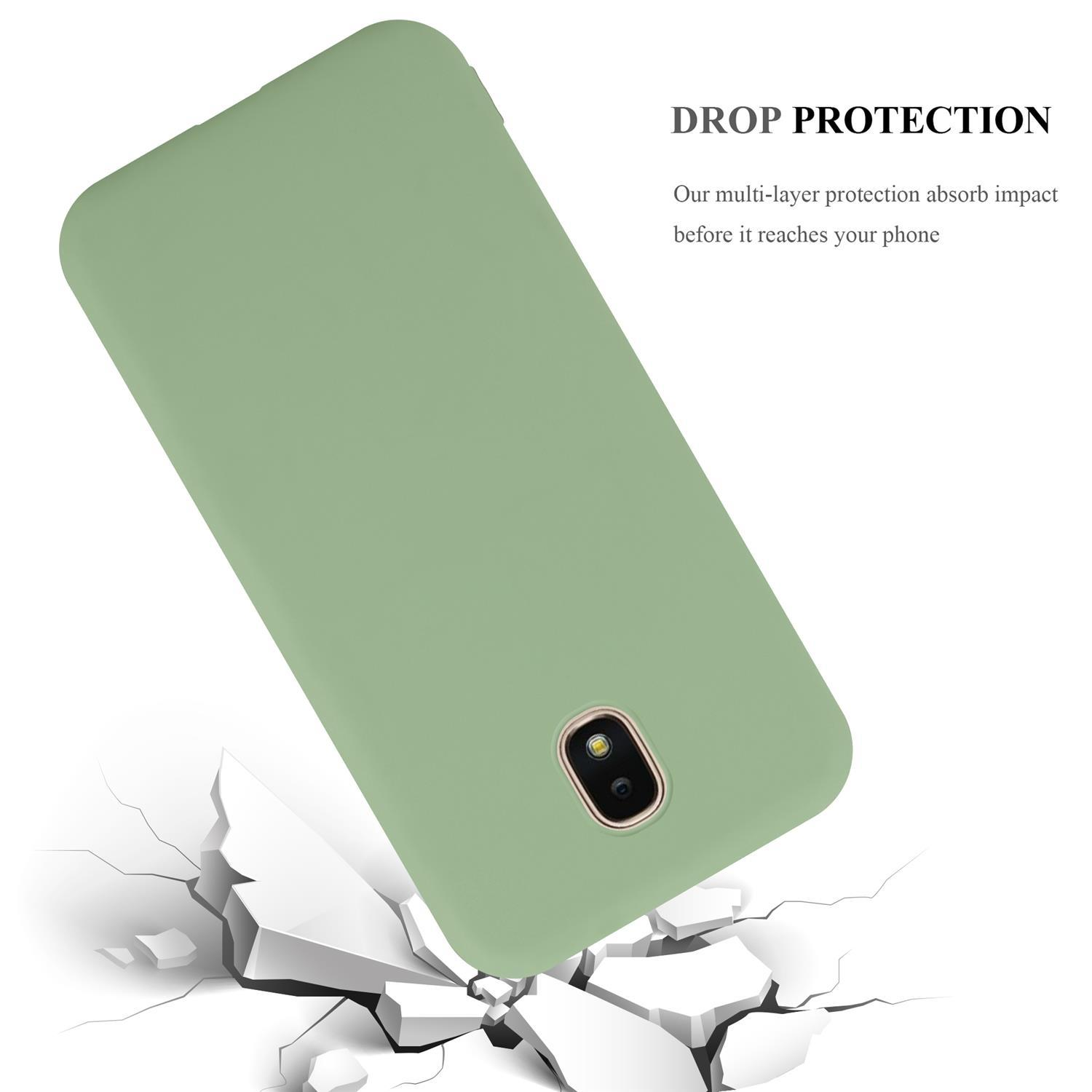 Una custodia per telefono verde chiaro inclinata, con una superficie incrinata sottostante, che mostra la protezione dalle cadute del prodotto.