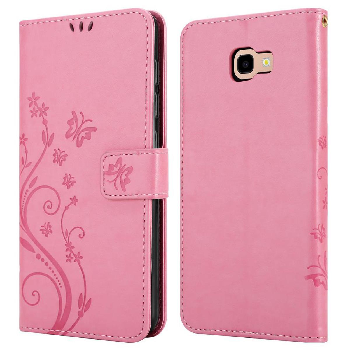 Custodia rosa per telefono con design floreale e chiusura magnetica. Sfondo bianco.