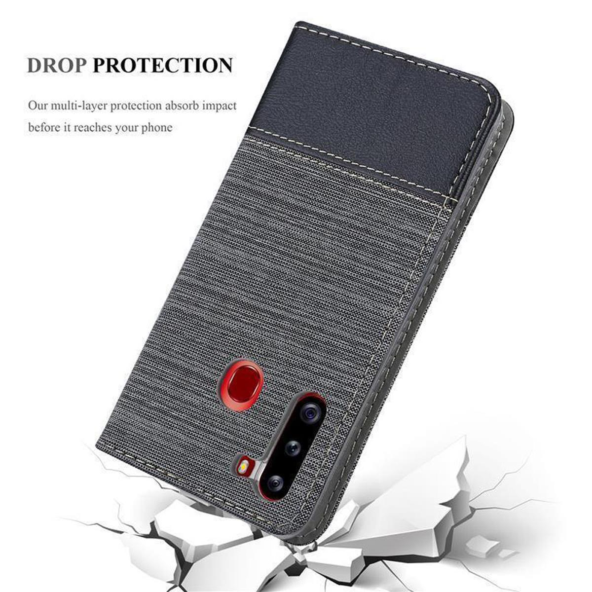 Custodia per telefono con protezione dalle cadute. Colore grigio e nero. Sfondo grigio con crepe.