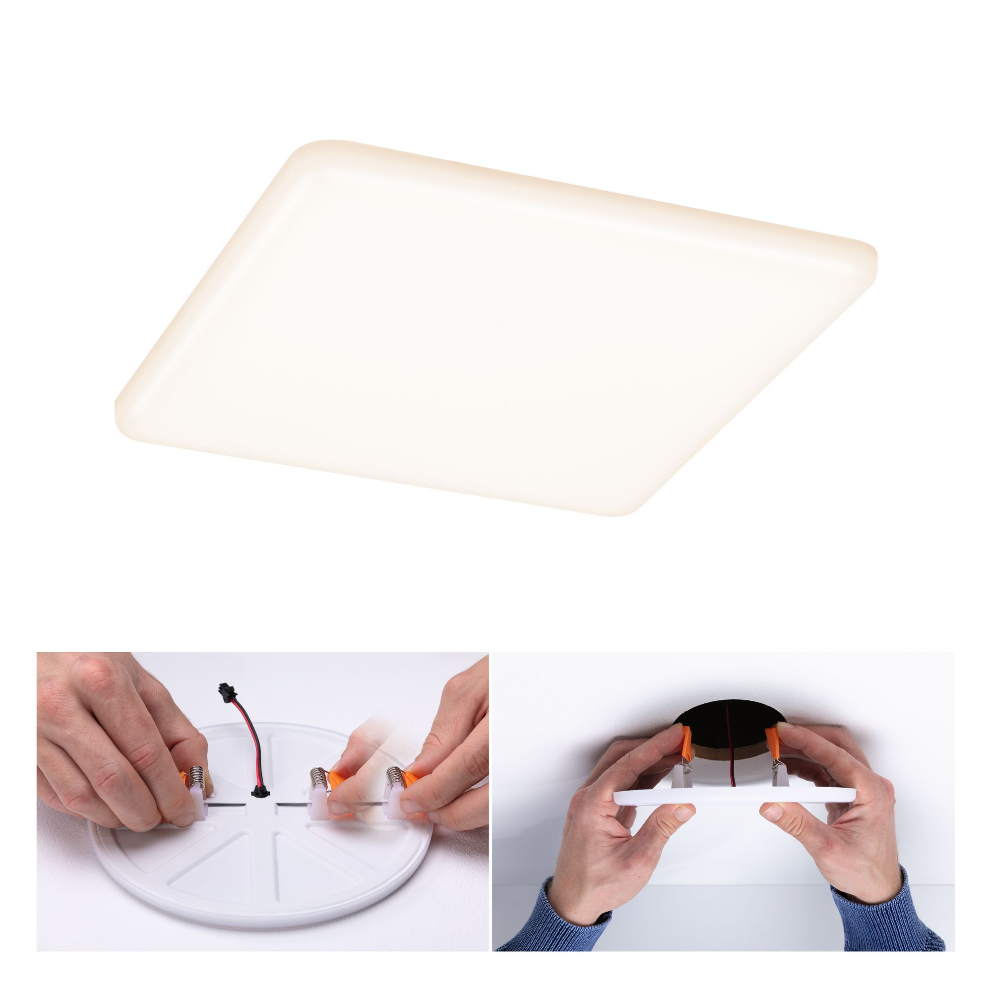 Plafoniera quadrata bianca con una calda luce. Una mano la sta installando con fili e clip arancioni.