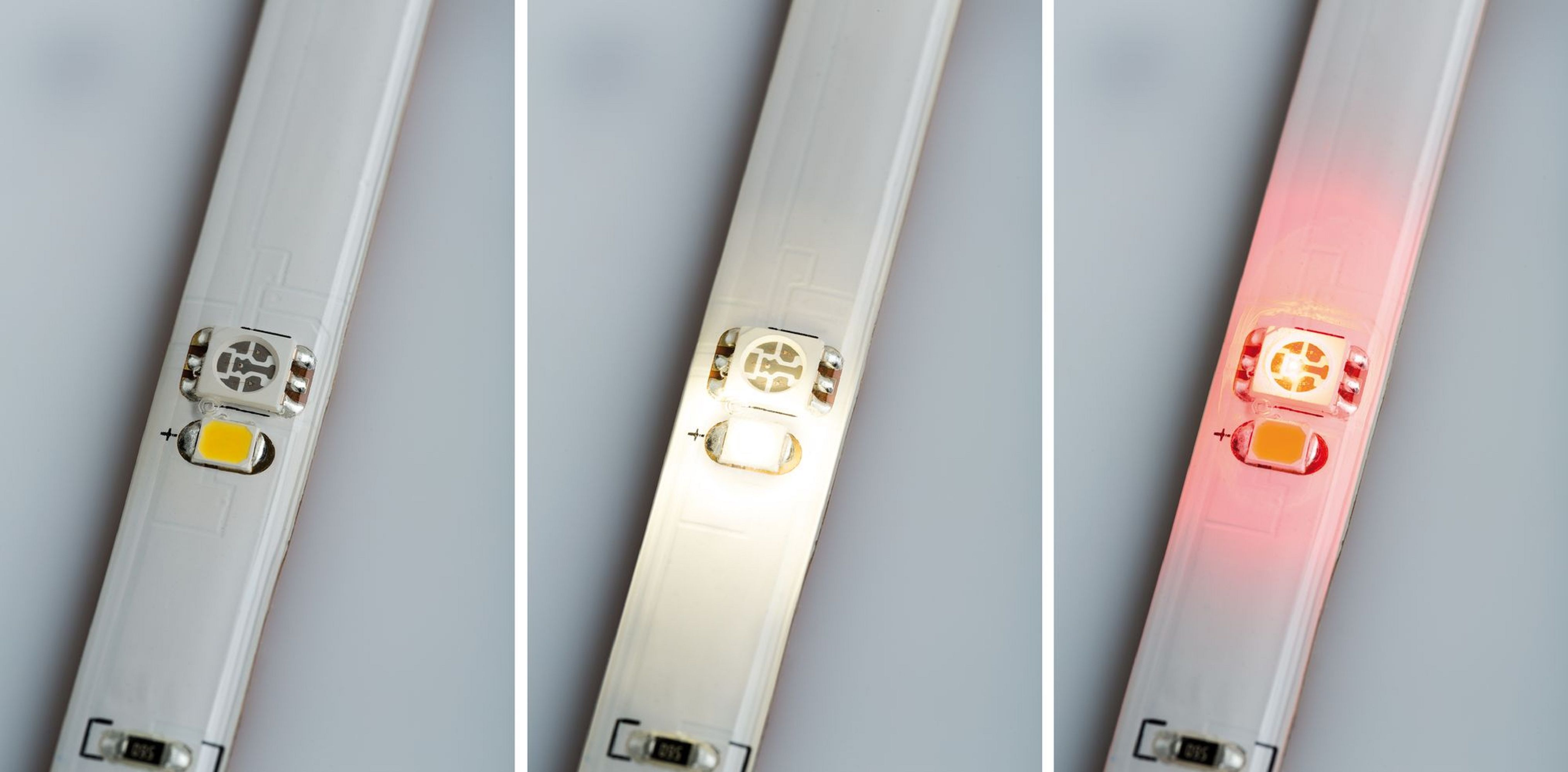 Primo piano di una striscia LED, che mostra segmenti di luce bianca, calda e rossa.