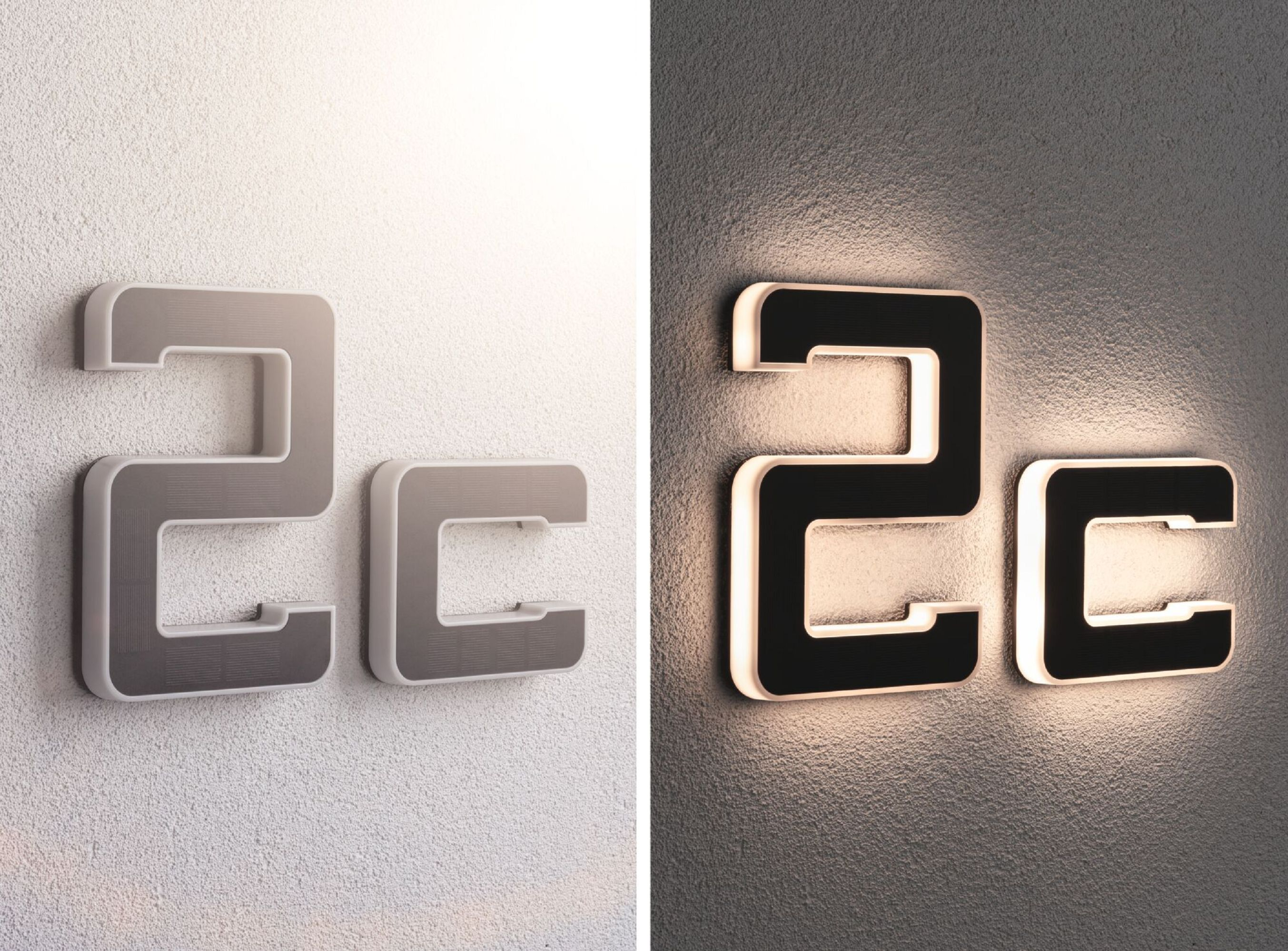 Zwei beleuchtete 2C-Wandschilder, eines beleuchtet und eines unbeleuchtet, an einer weißen Wand.
