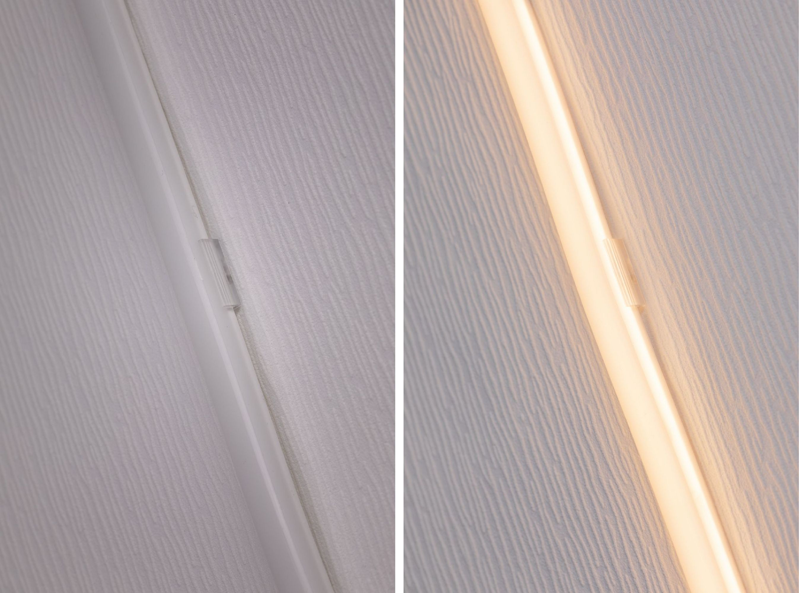 Nahaufnahme einer weißen Wand mit installiertem Lichtstreifen, halb beleuchtet.