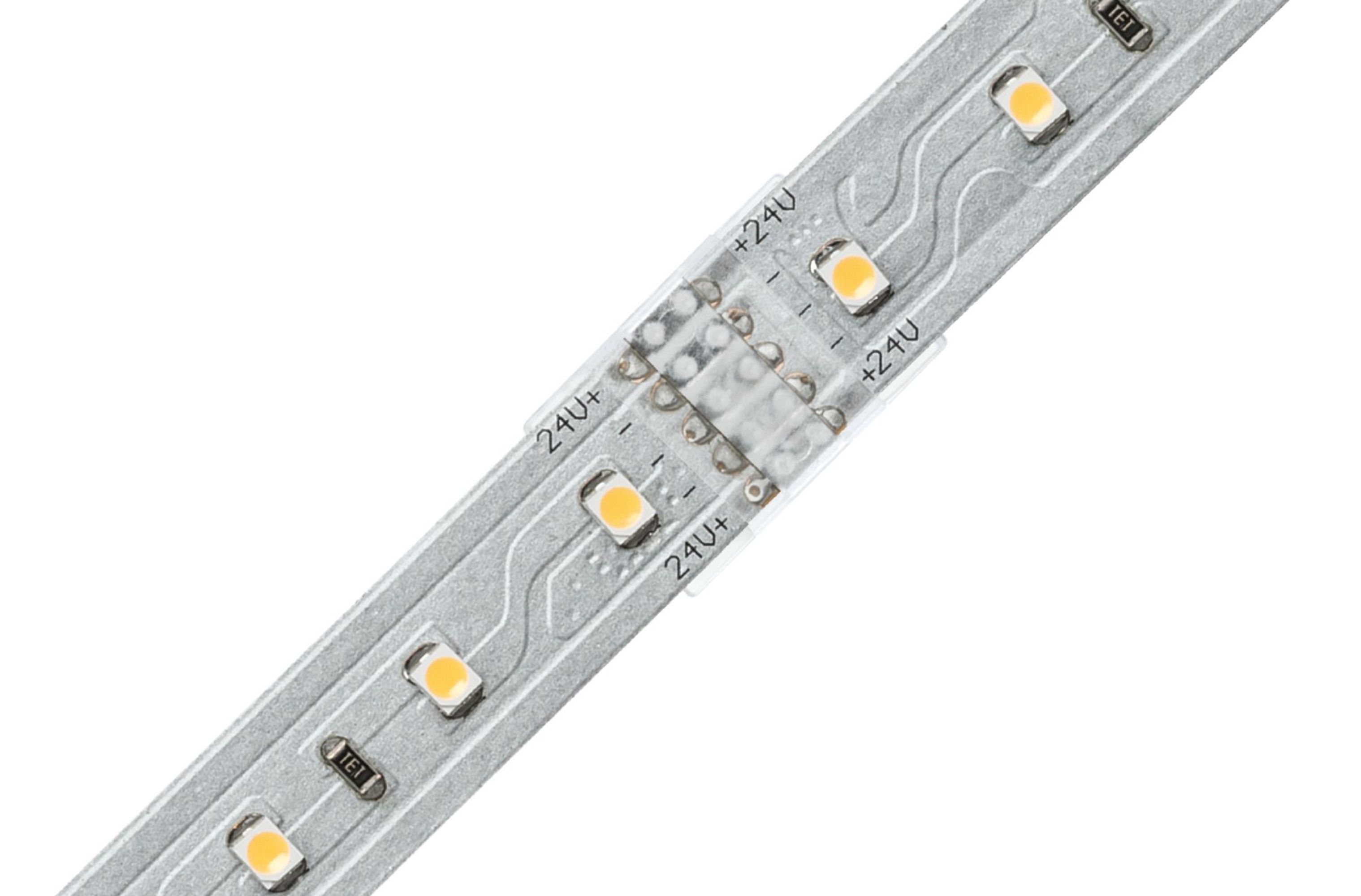 Nahaufnahme eines LED-Streifens mit gelben Dioden und elektrischen Markierungen.