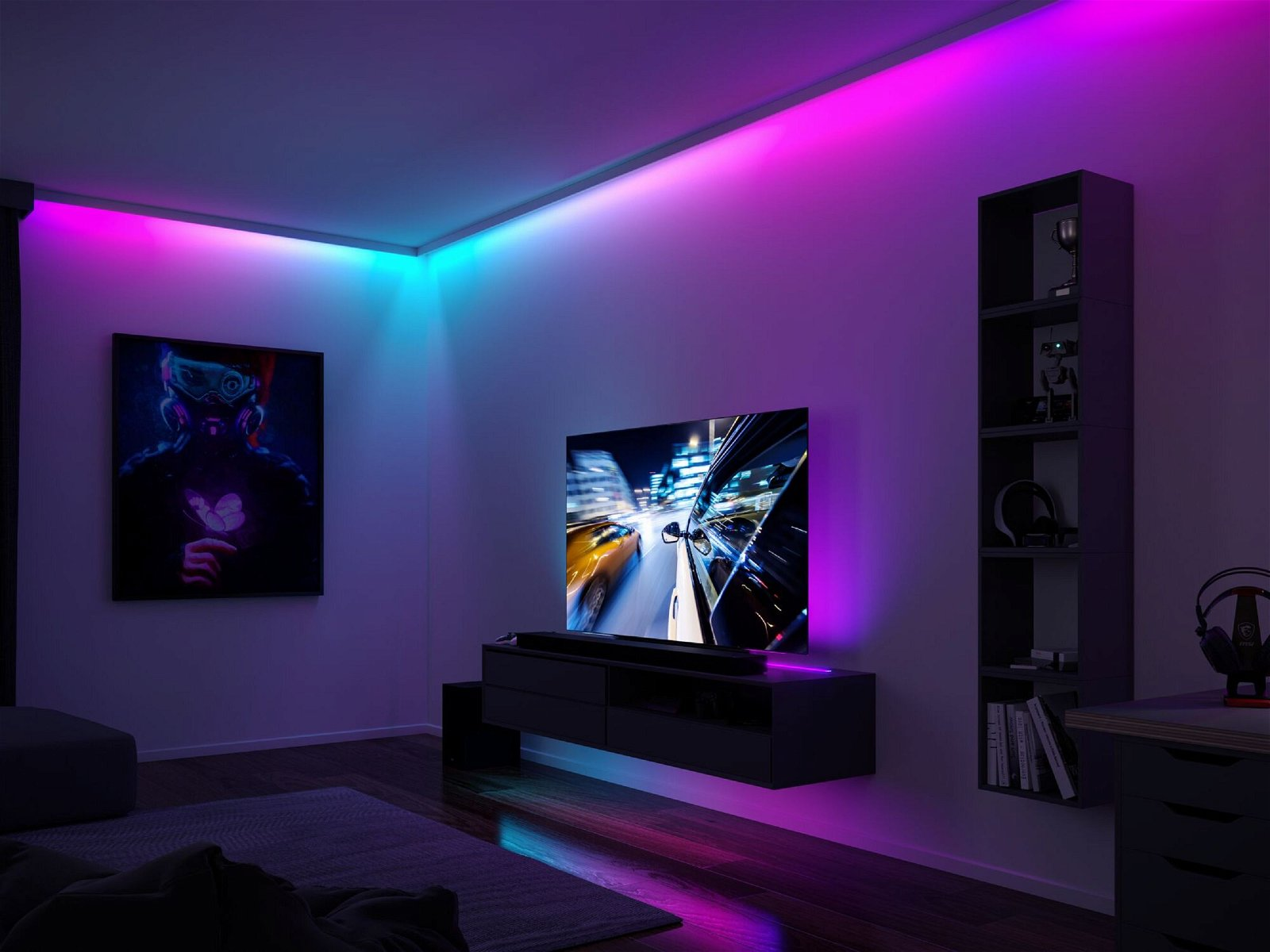Pokój z telewizorem, grafiką i oświetleniem LED. Oświetlenie tworzy kolorową atmosferę.