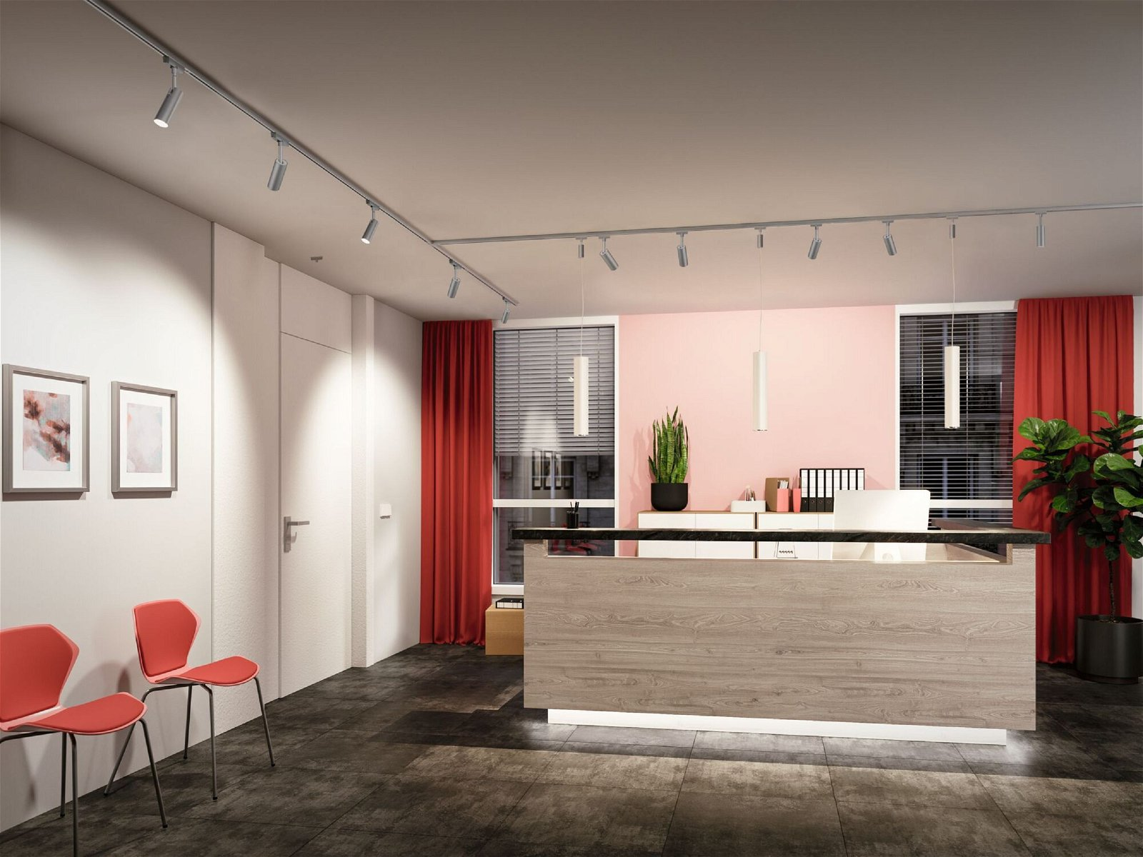 Empfangsbereich mit roten Stühlen, Holztisch und rosa Wand.