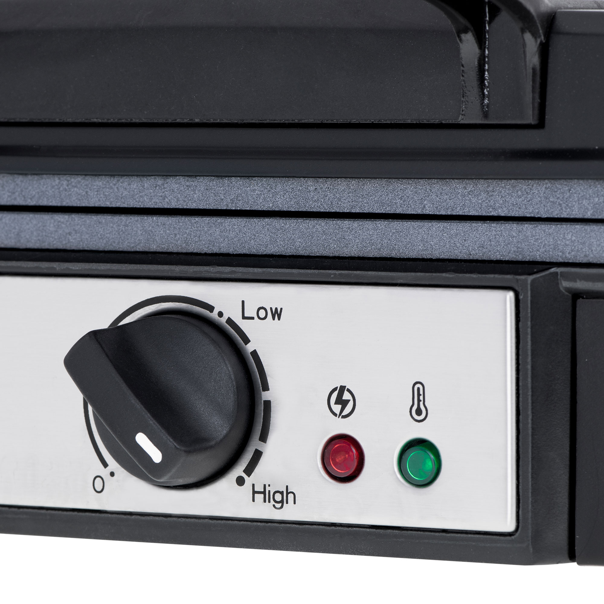 Zbliżenie czarnego pokrętła urządzenia z ustawieniami Opcji Low i High, czerwone i zielone kontrolki.