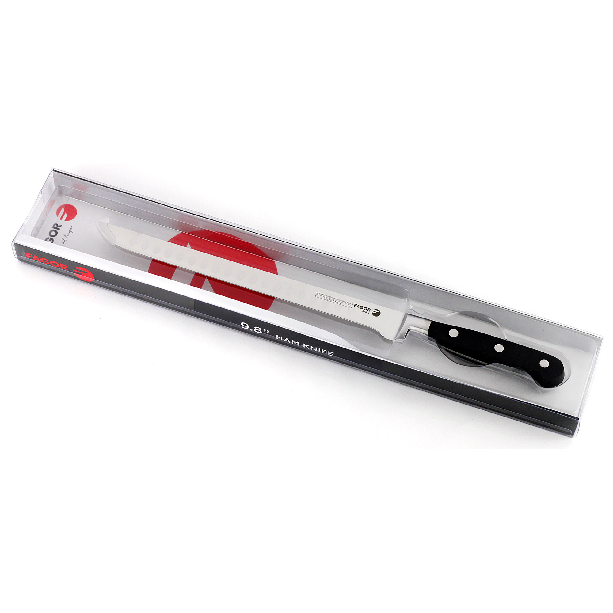 Cuchillo jamonero en caja transparente, mango negro, sobre superficie blanca.