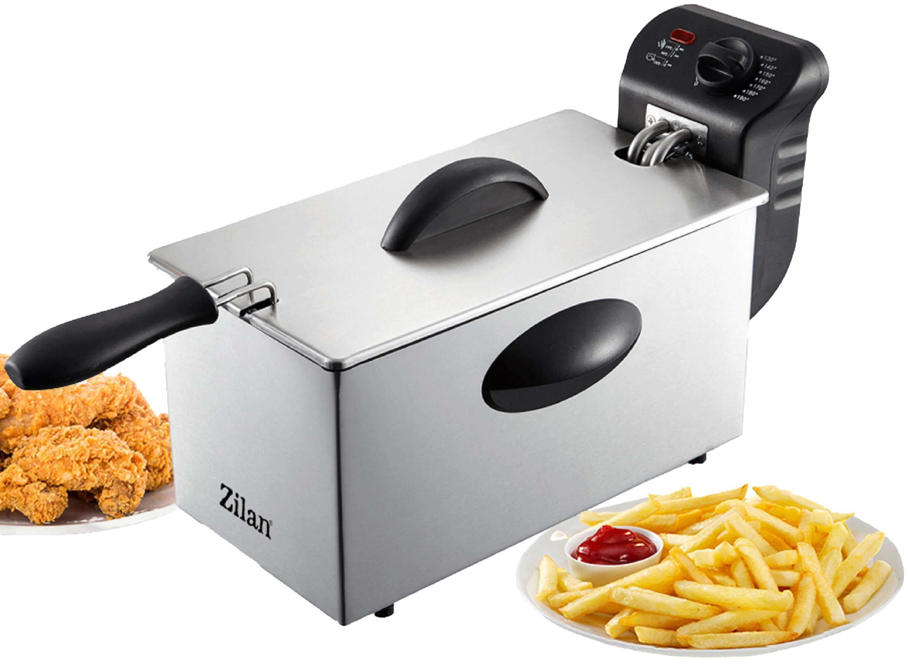 Kızarmış tavuk ve patates kızartması ile derin yağda kızartma makinesi. Kızartma makinesi gümüş rengidir. Yiyecekler, ketçaplı beyaz tabaklarda.