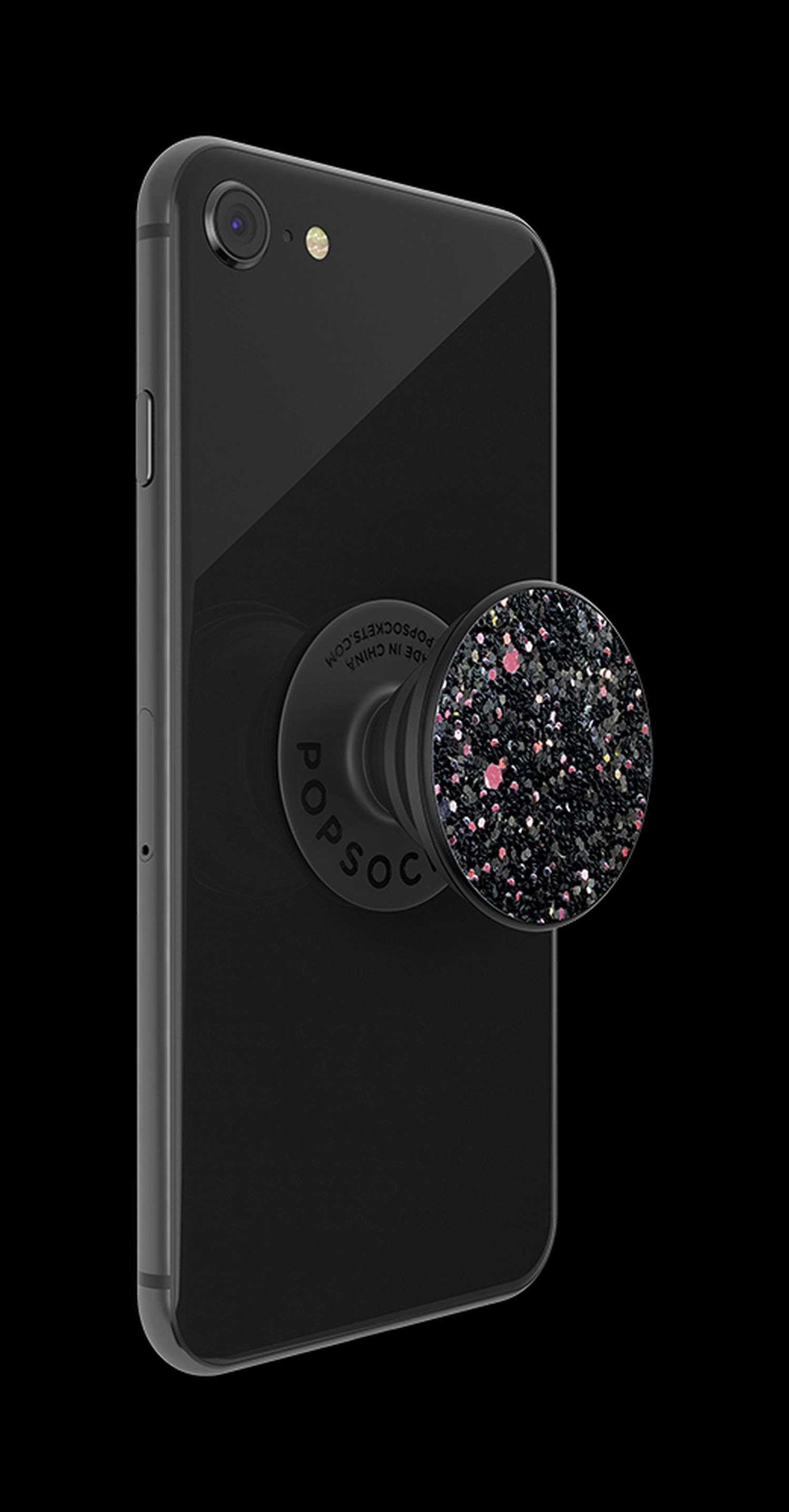 Un teléfono inteligente negro con un PopSocket negro adjunto en la parte posterior.
