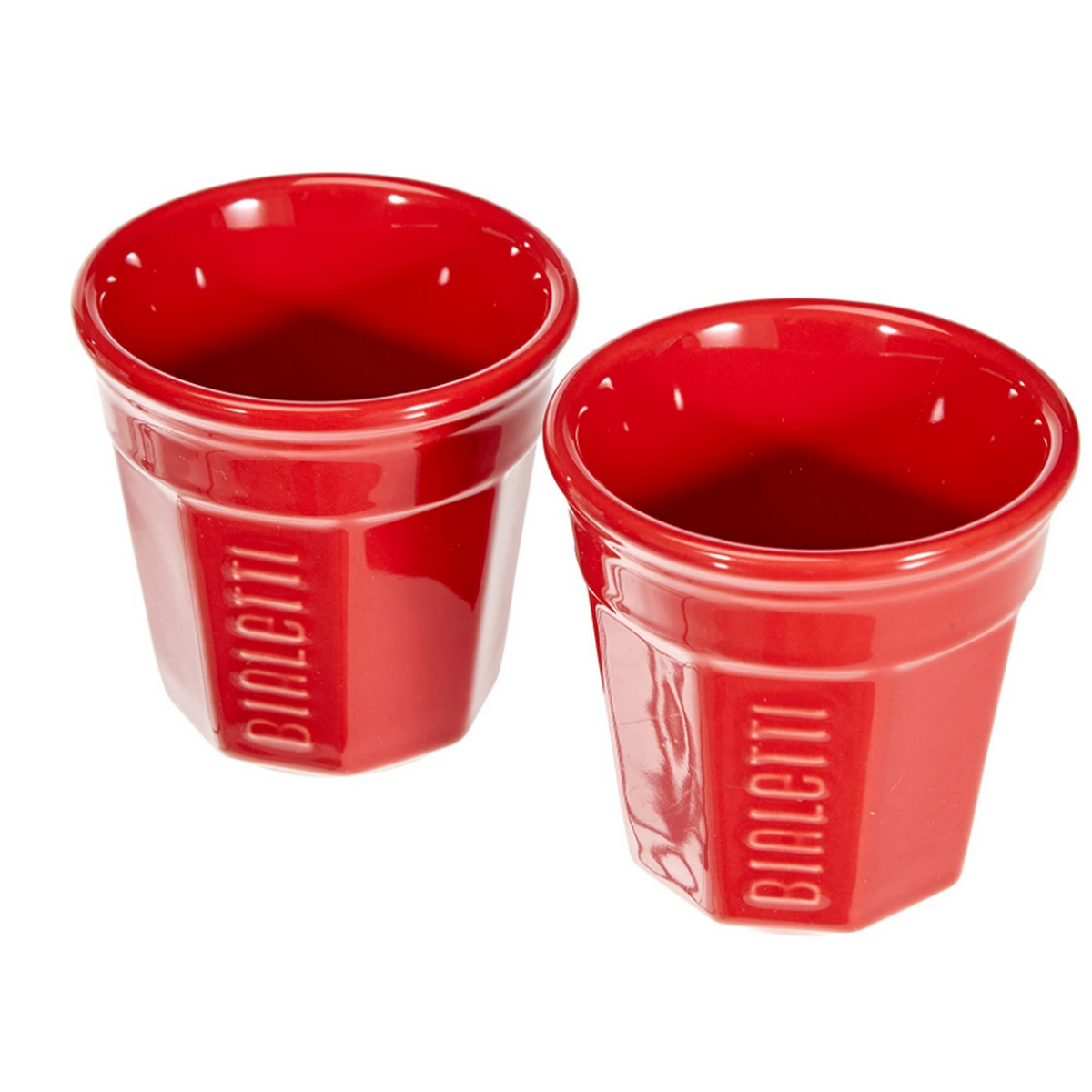 Dwie czerwone ceramiczne filiżanki do espresso Bialetti. Filiżanki są sześciokątne i mają napis.