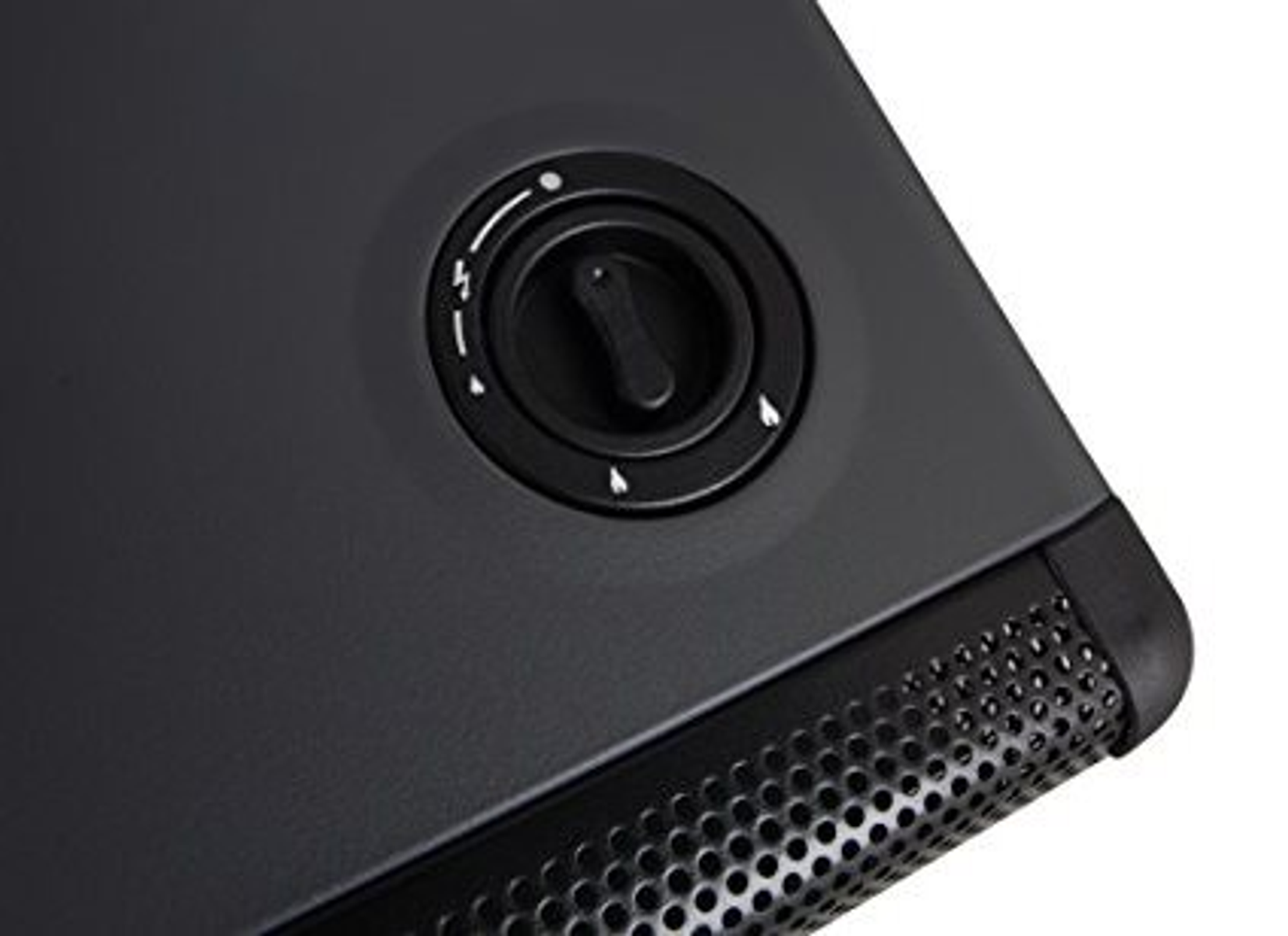 Primer plano de un dial de control negro con símbolos y flechas, parte de un dispositivo.