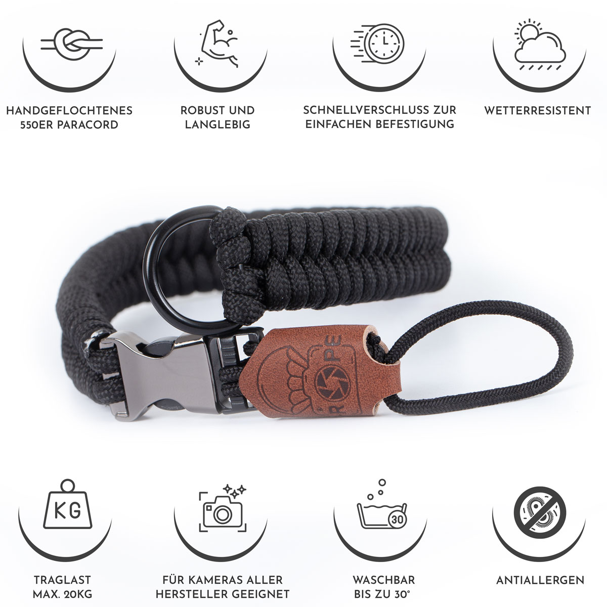 Un cinturino da polso per fotocamera in paracord nero con toppa in pelle marrone e chiusura argentata, circondato da icone.