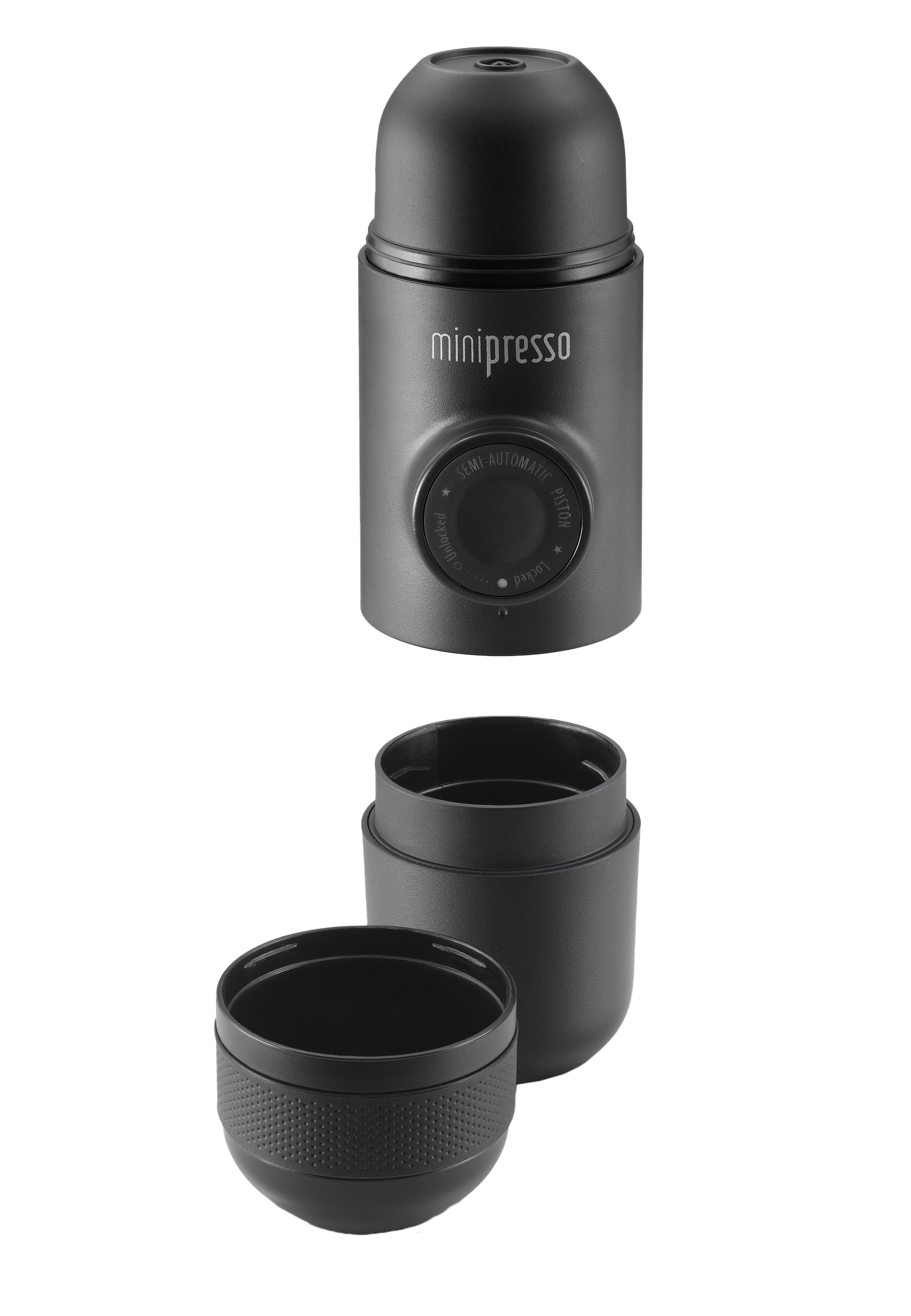 Eine schwarze Mini-Espressomaschine, zerlegt. Weißer Hintergrund.