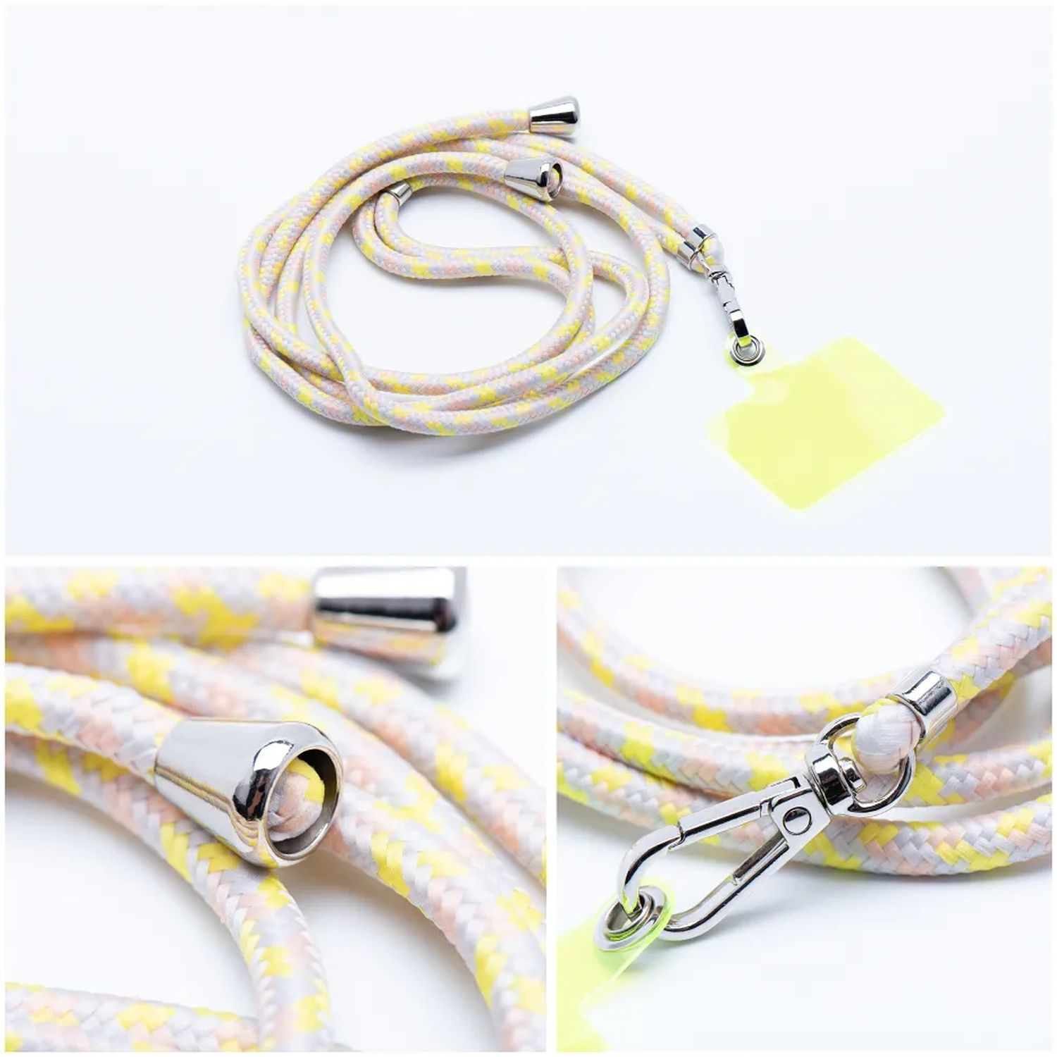 Handy-Lanyard mit gelben und rosa Akzenten. Metallverschlüsse und ein klares Kunststoffteil sind ebenfalls sichtbar.
